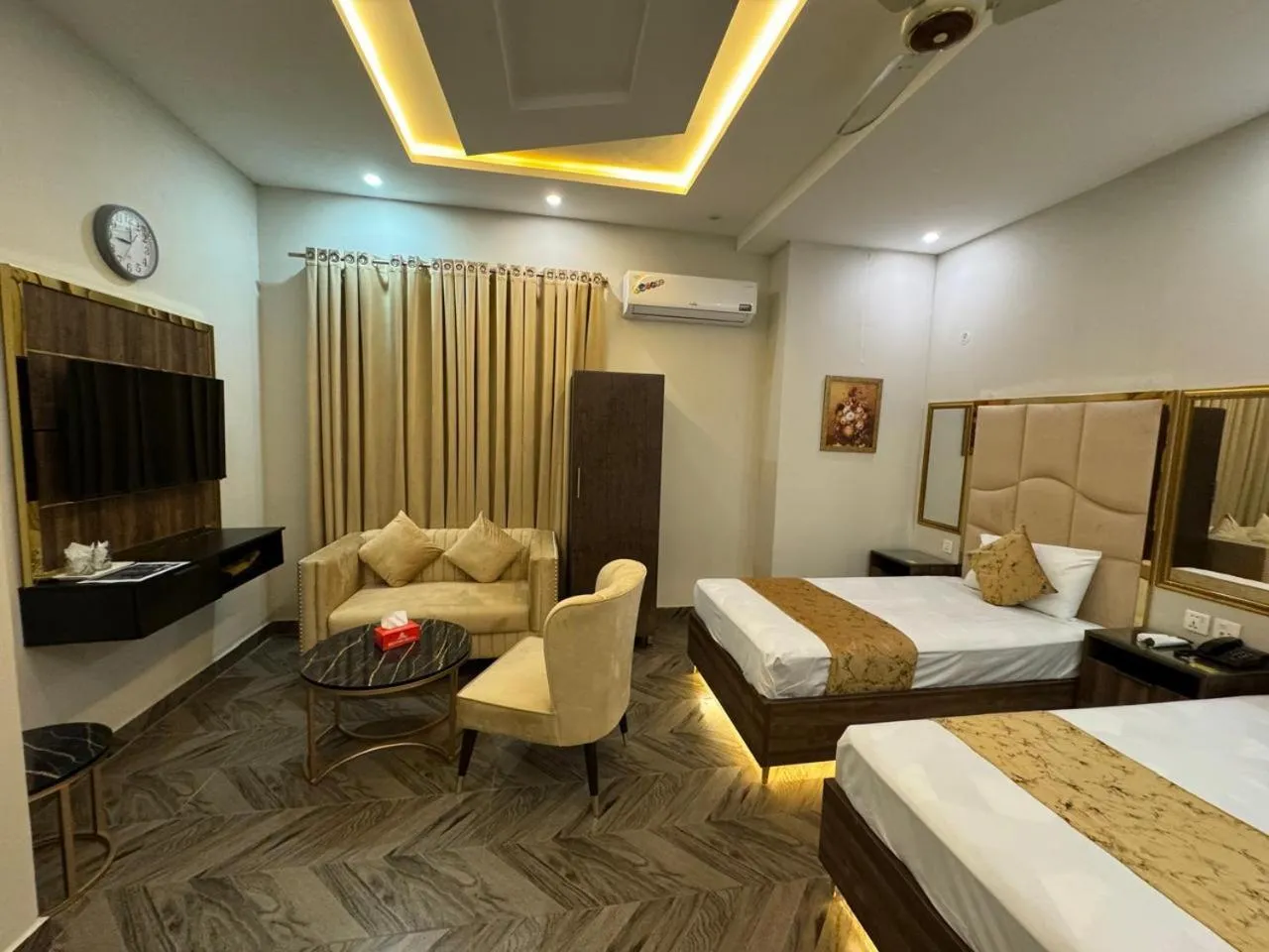 Bed in Gold Pine Hotel Lahore