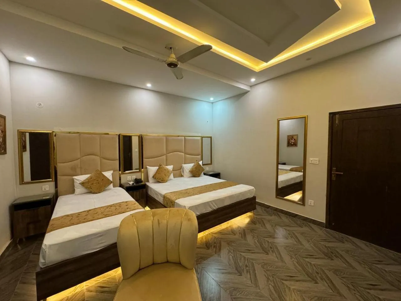 Bed in Gold Pine Hotel Lahore