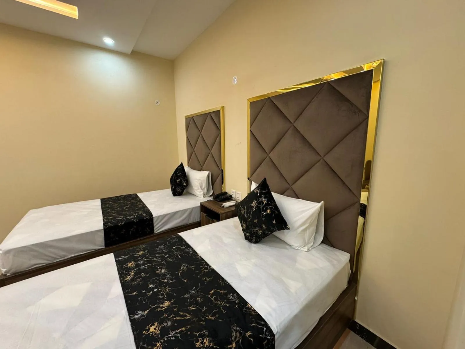 Photo of the whole room, Bed in Gold Pine Hotel Lahore