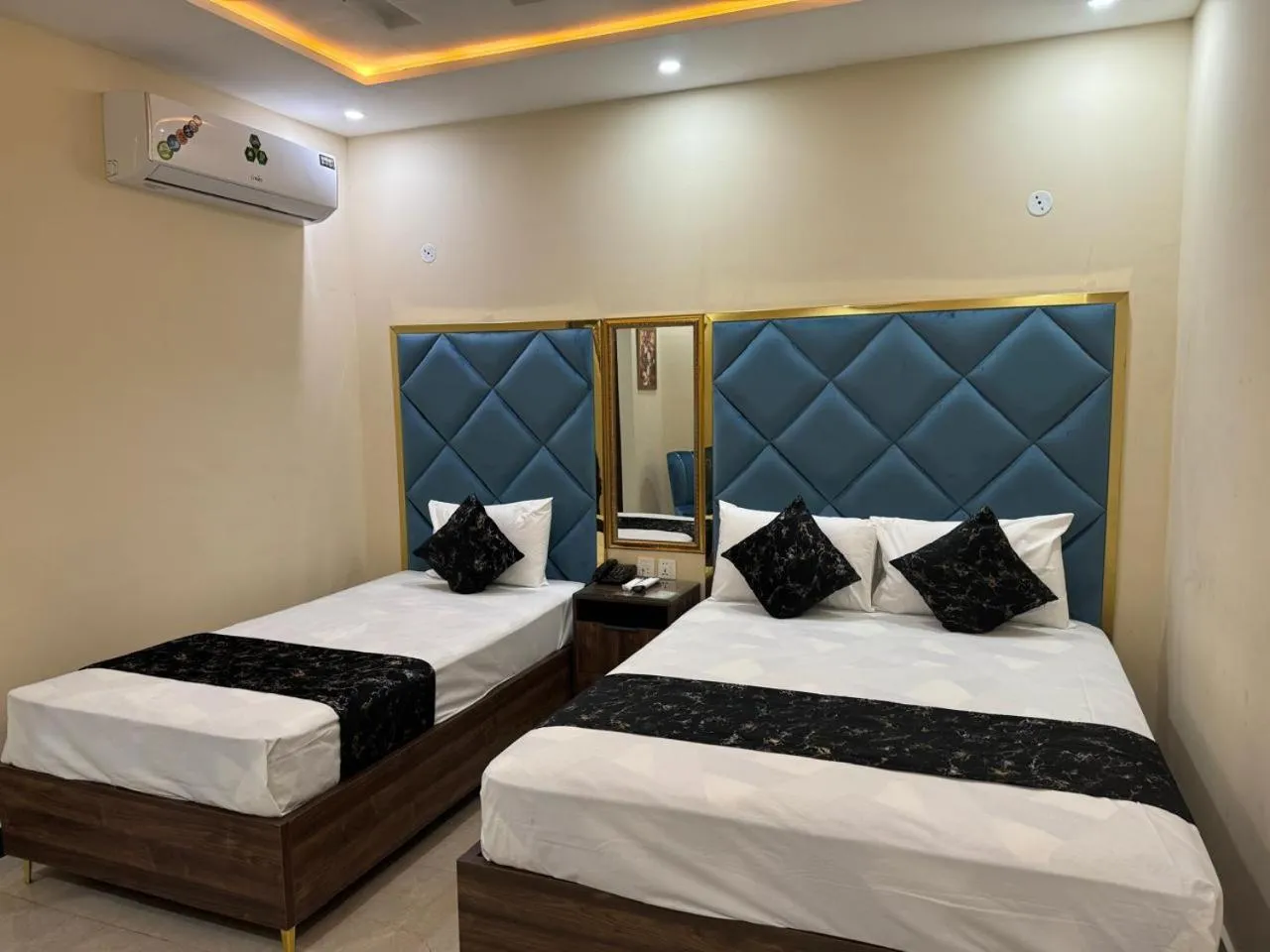 Photo of the whole room, Bed in Gold Pine Hotel Lahore