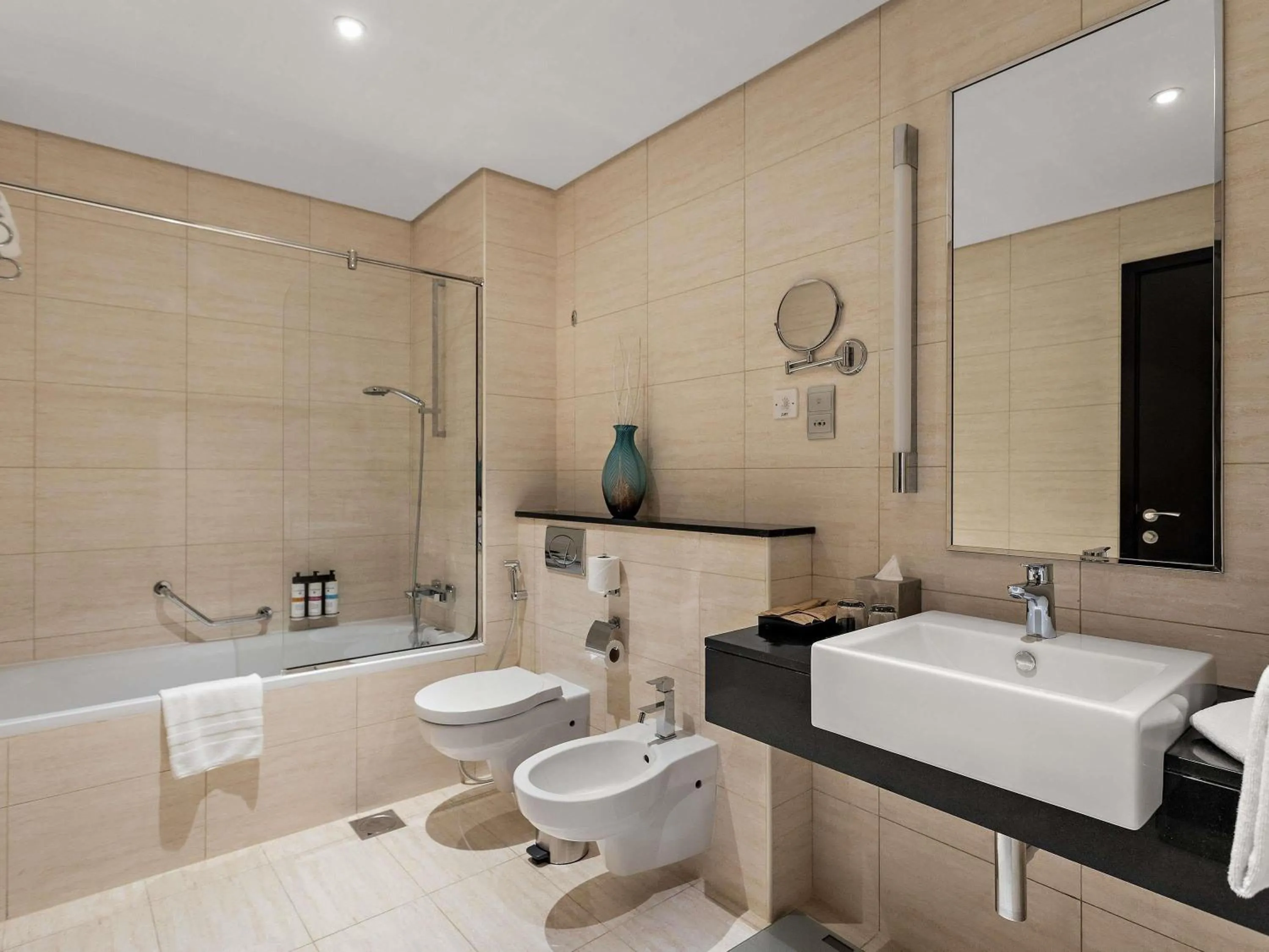 Bedroom in Pullman Dubai Jumeirah Lakes Towers