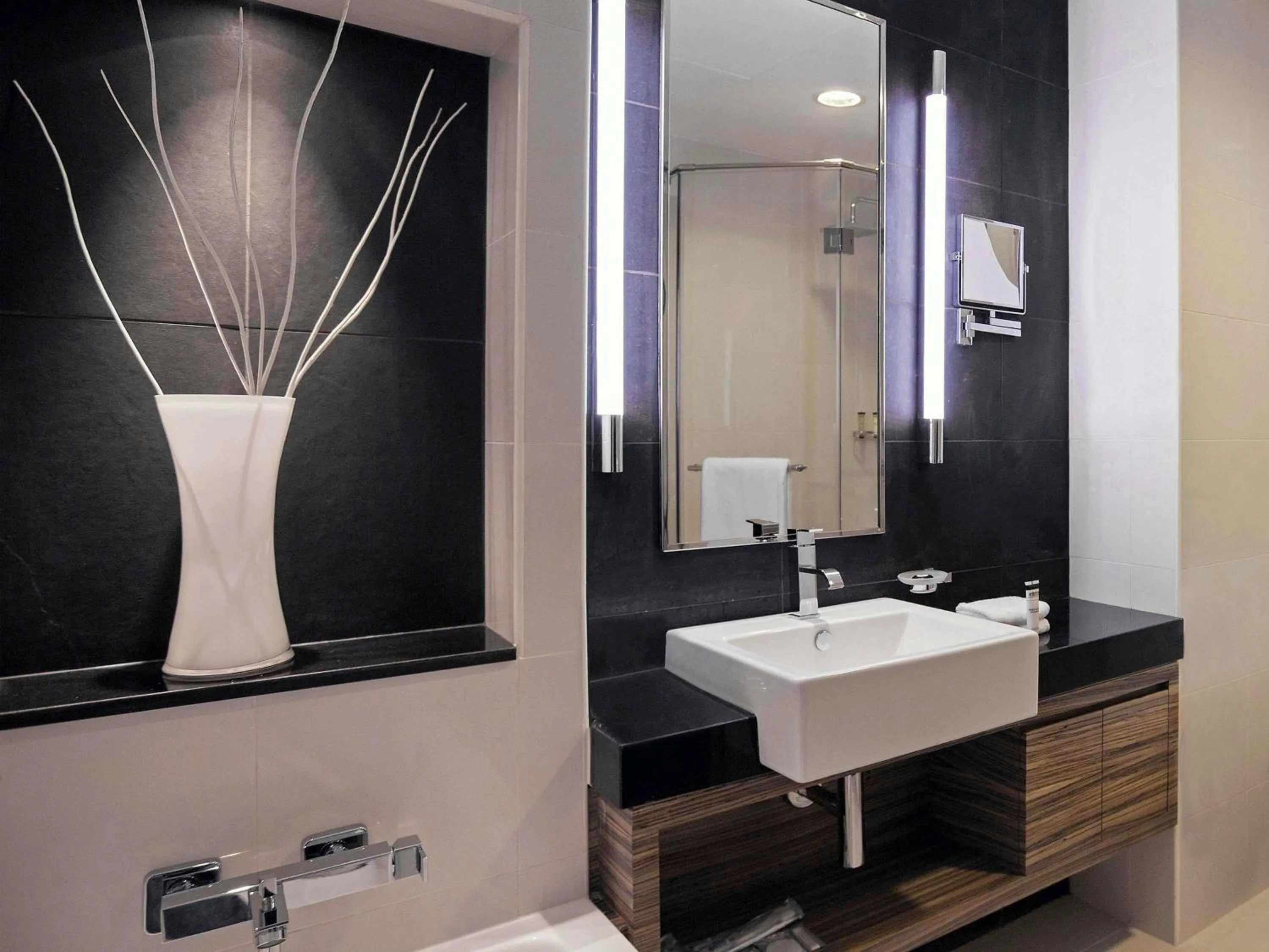 Bedroom in Pullman Dubai Jumeirah Lakes Towers