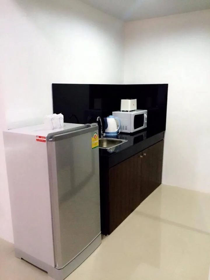 Kitchen or kitchenette in The Seashore Kamala Service Apartment