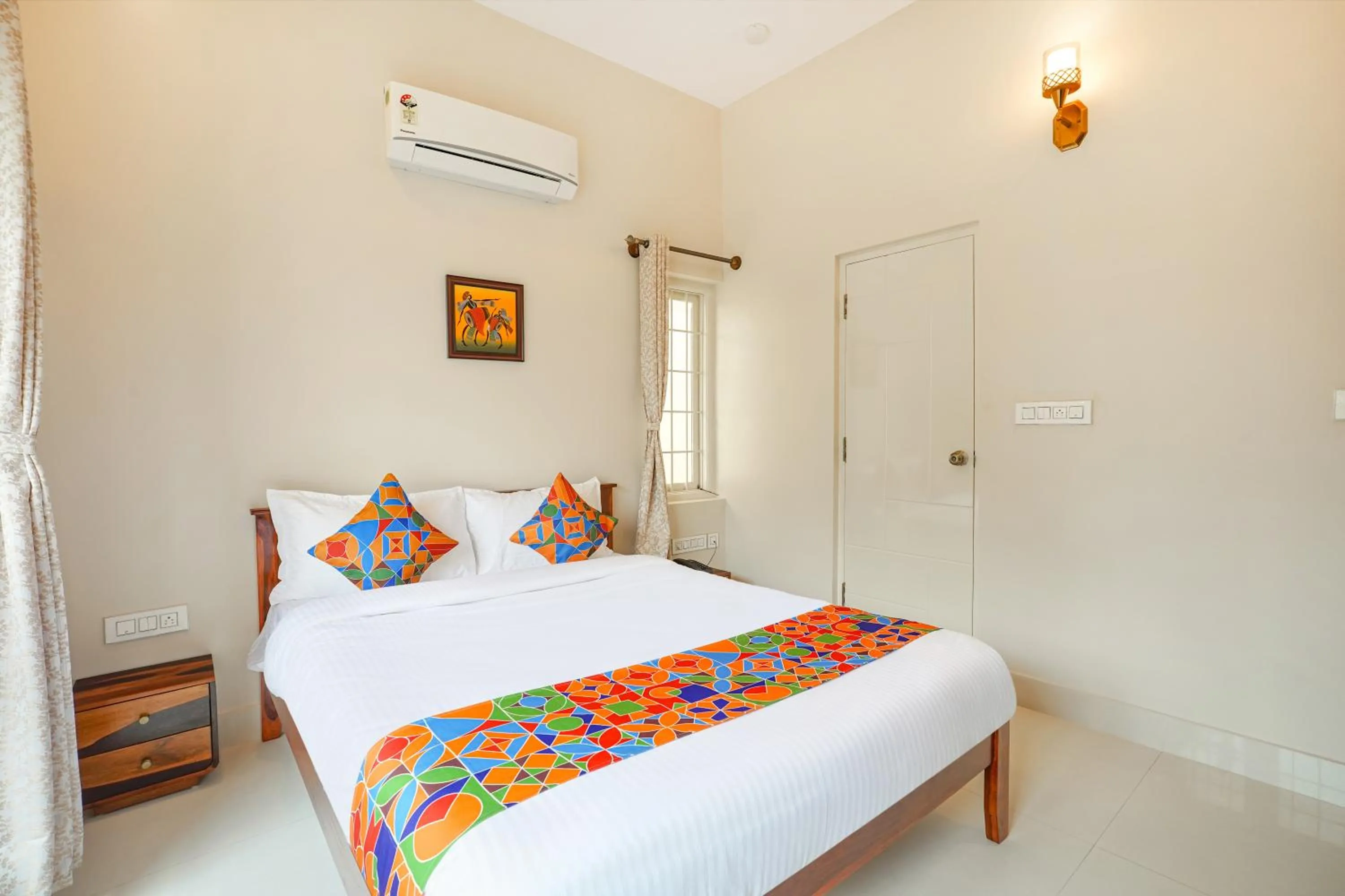 Bed in FabHotel Bougainvillea Suites - Horamavu
