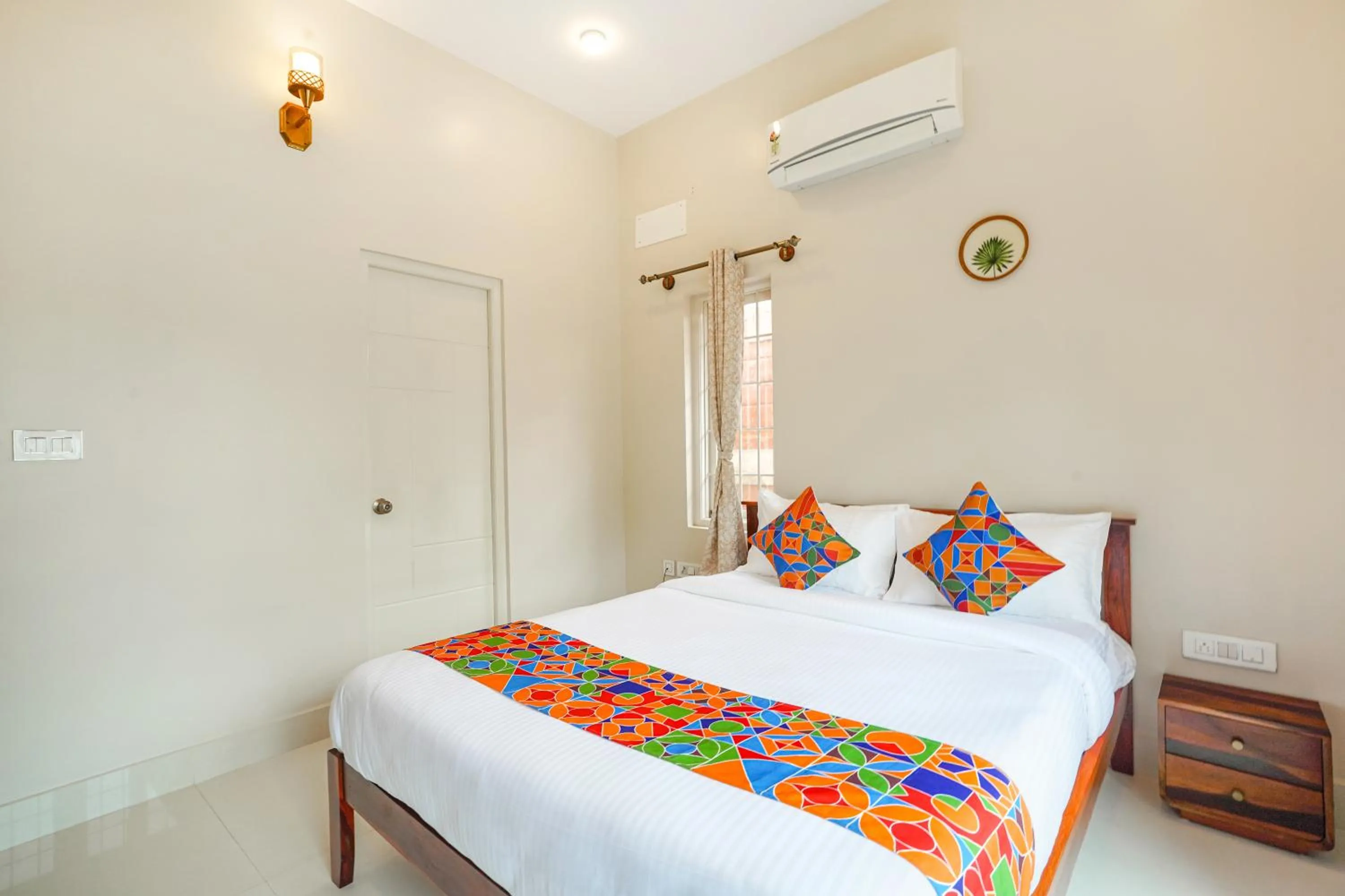 Bed in FabHotel Bougainvillea Suites - Horamavu