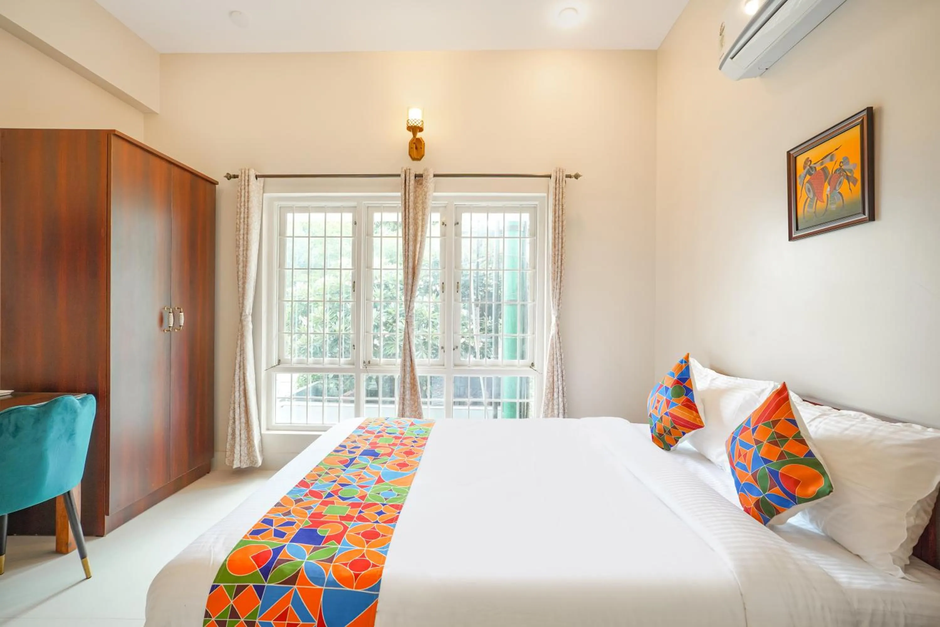 Bed in FabHotel Bougainvillea Suites - Horamavu