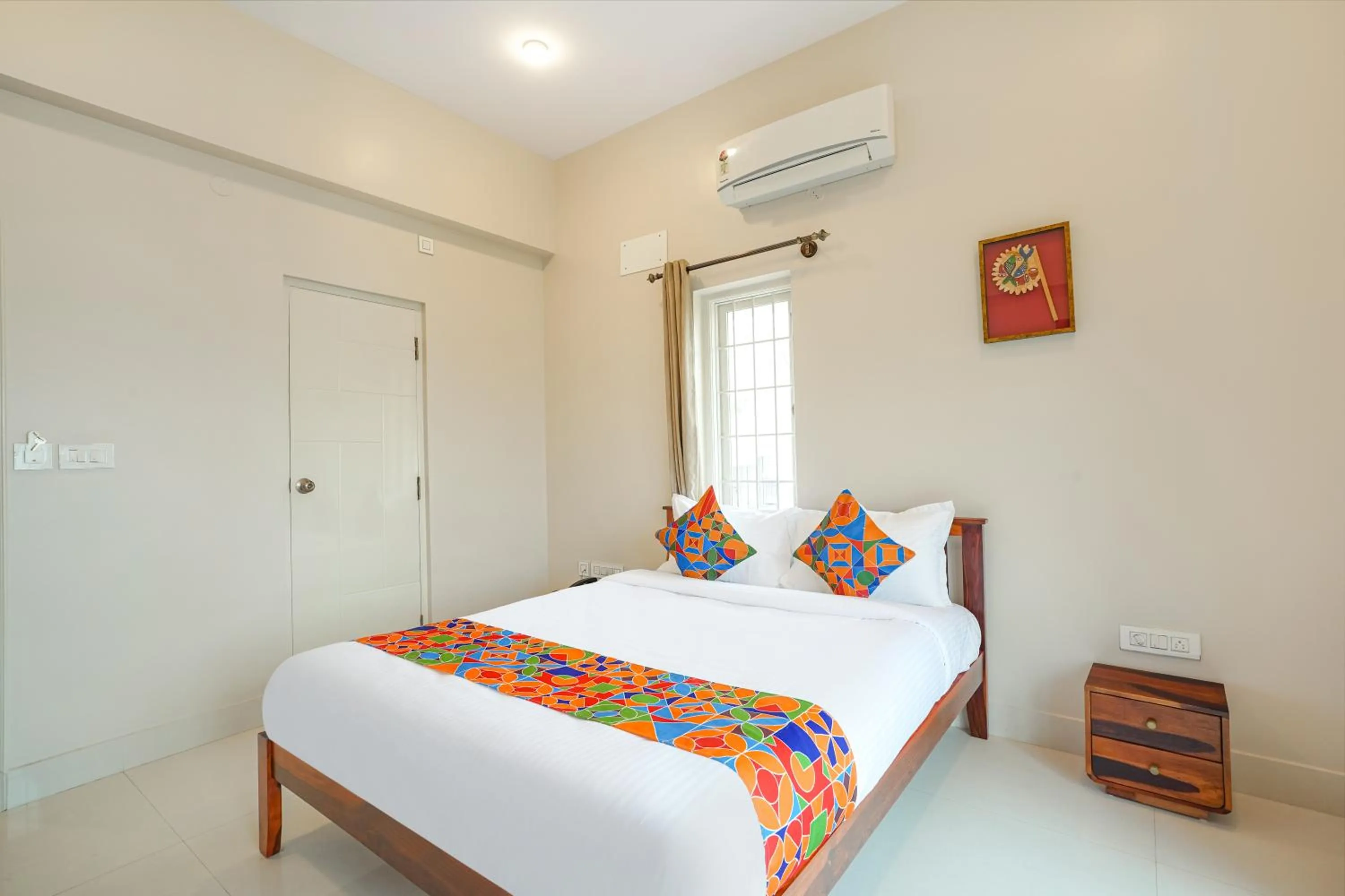 Bed in FabHotel Bougainvillea Suites - Horamavu