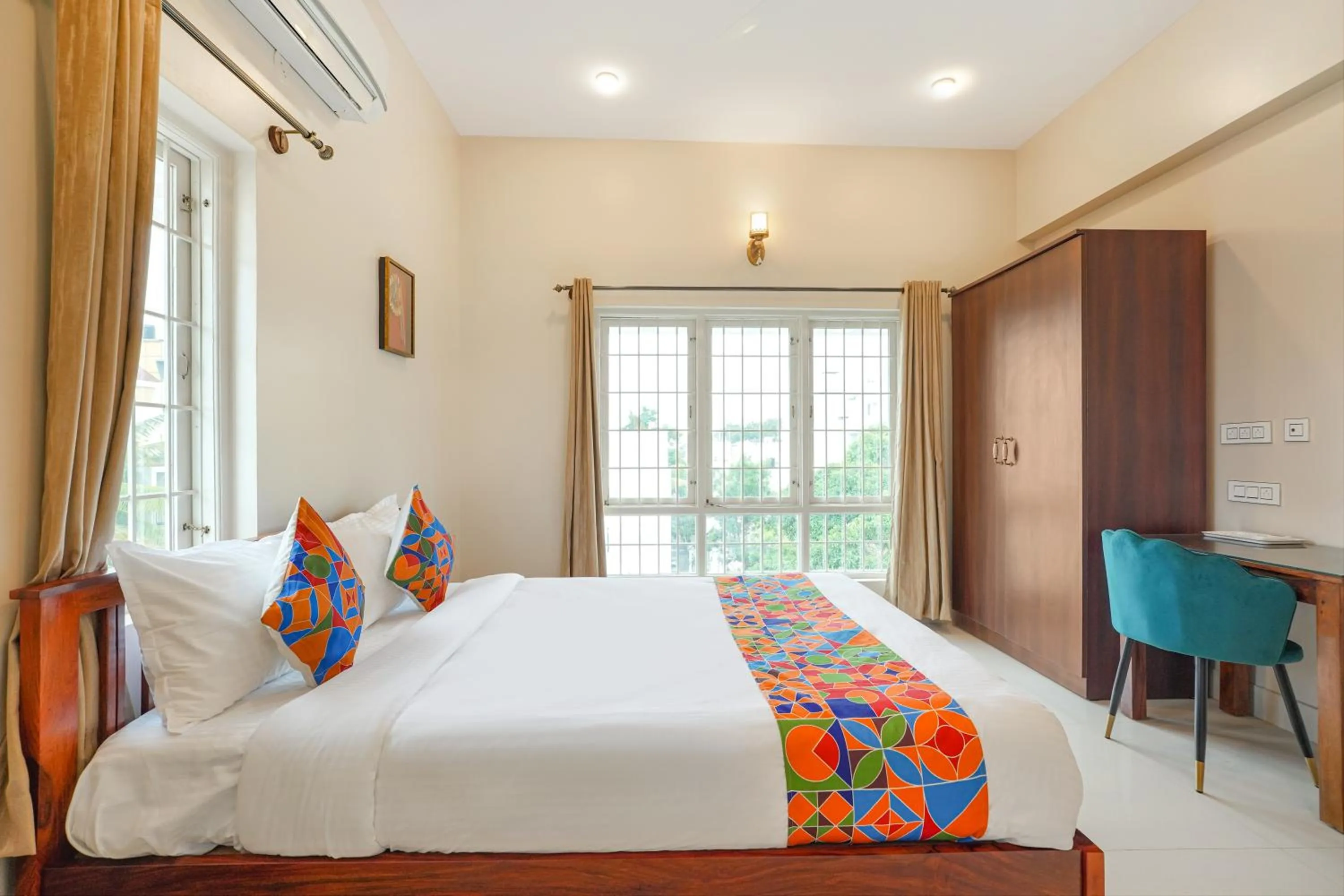 Bed in FabHotel Bougainvillea Suites - Horamavu