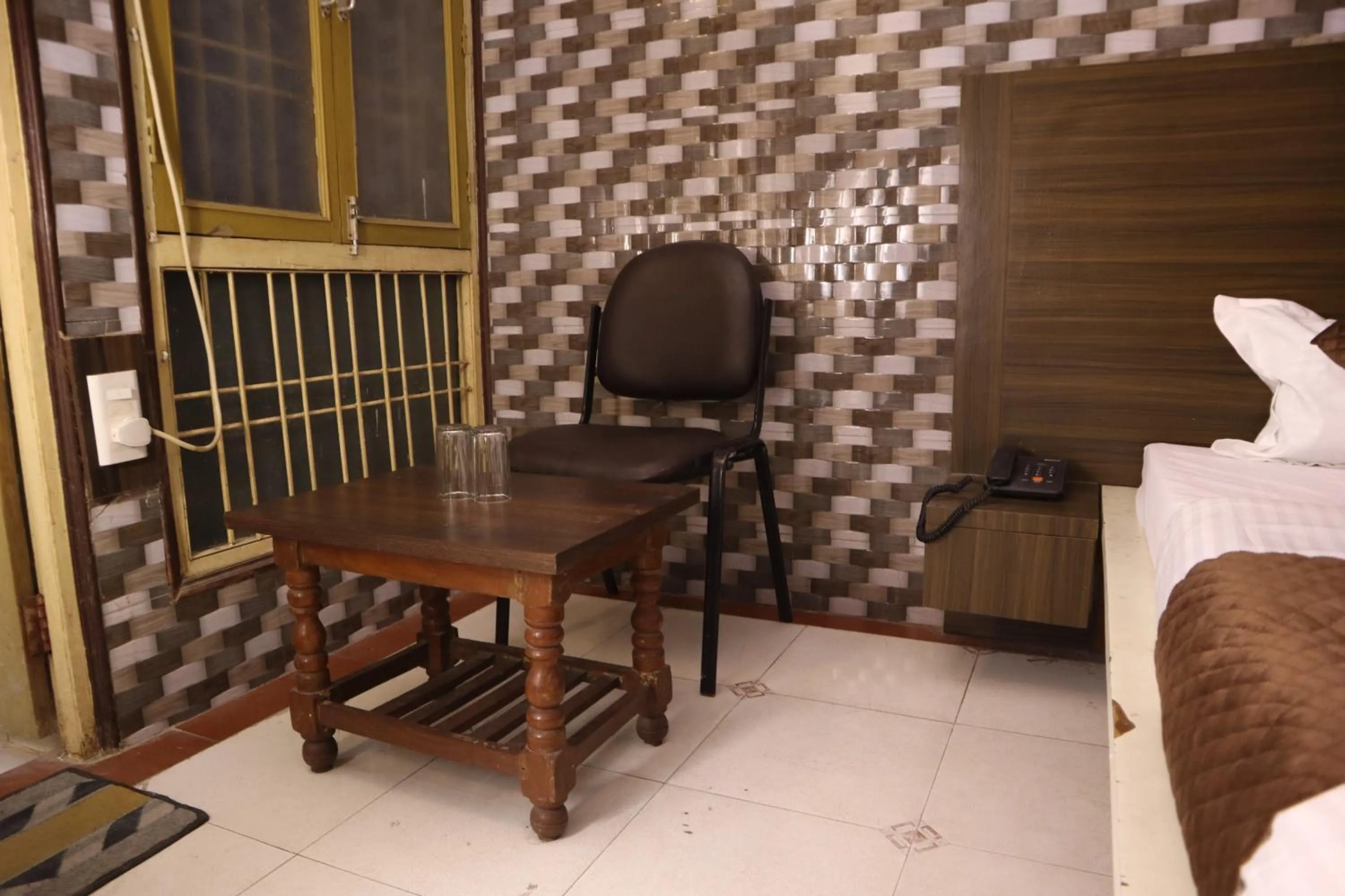 Seating area, Bed in PR Palace