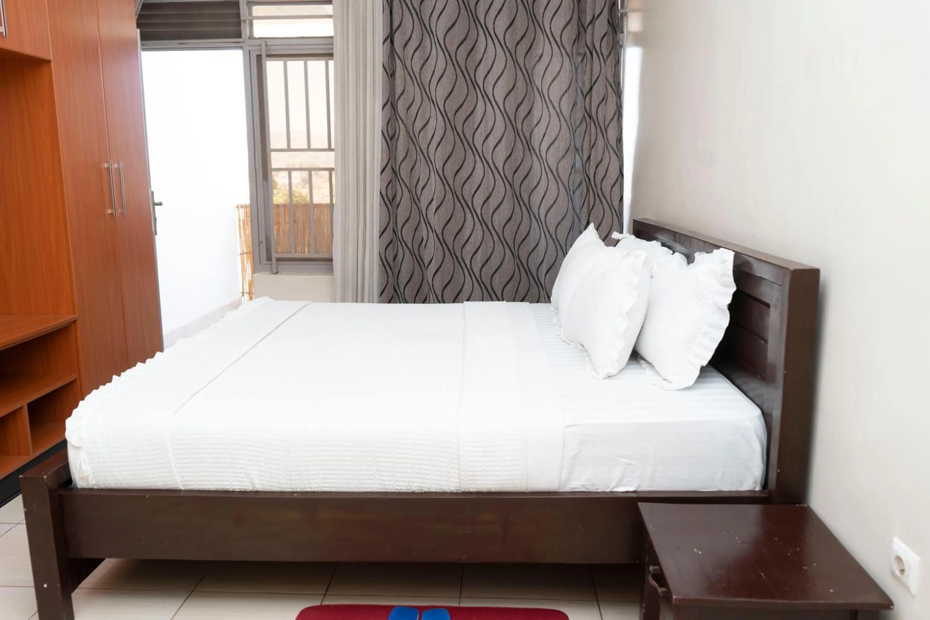 Bed in Green View Apartments