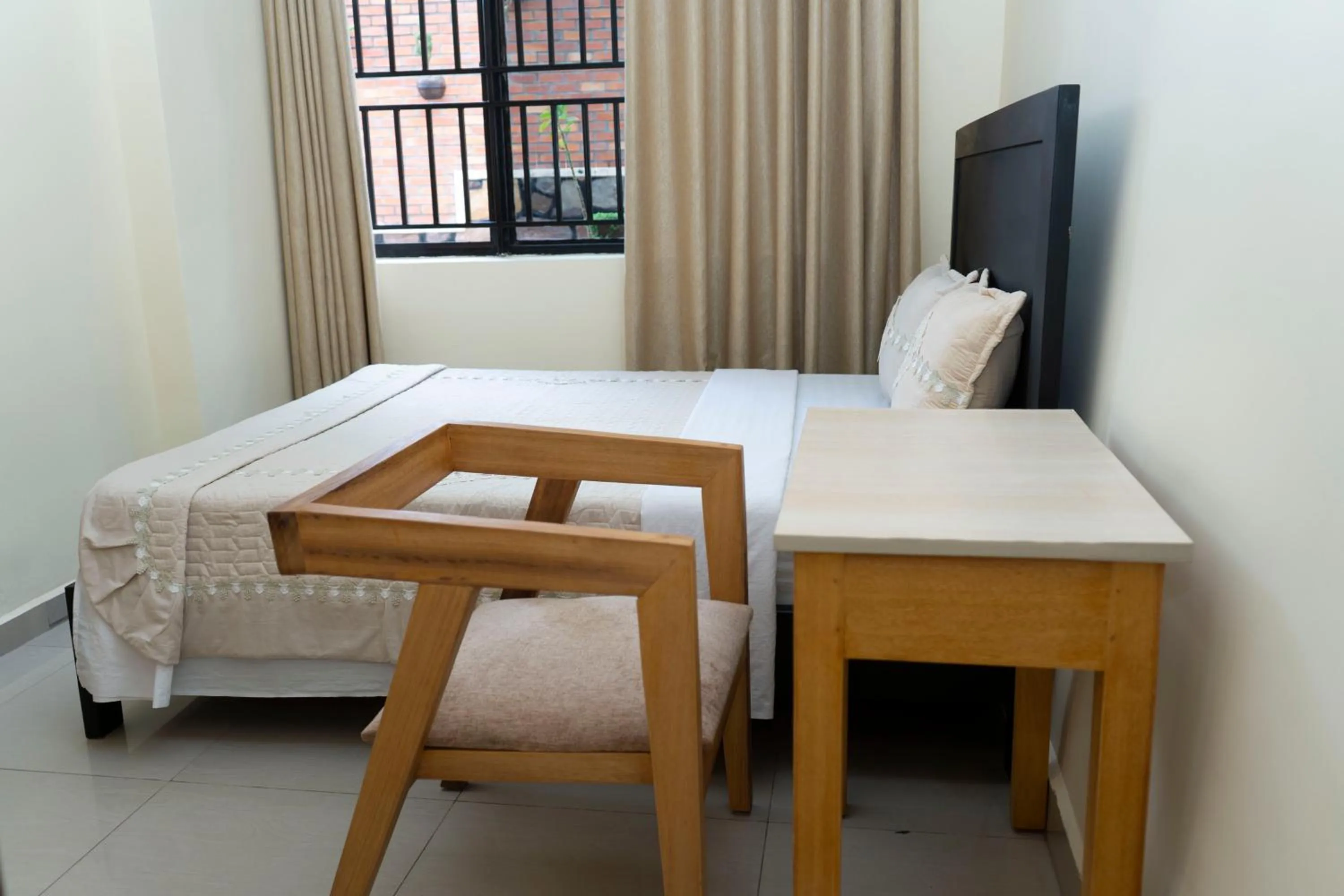 Bed in Green View Apartments