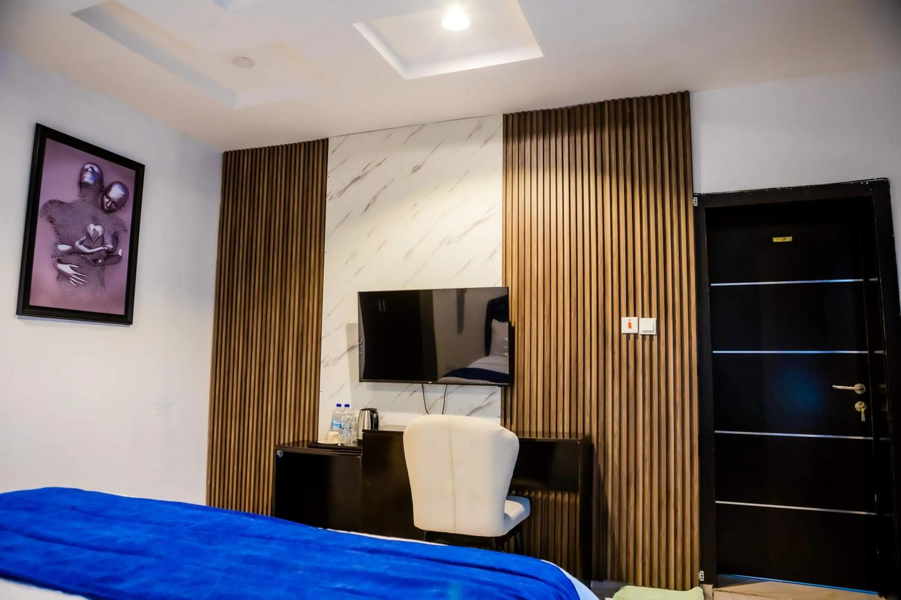 Bedroom, Bed in El Elyon Hotel and Suites