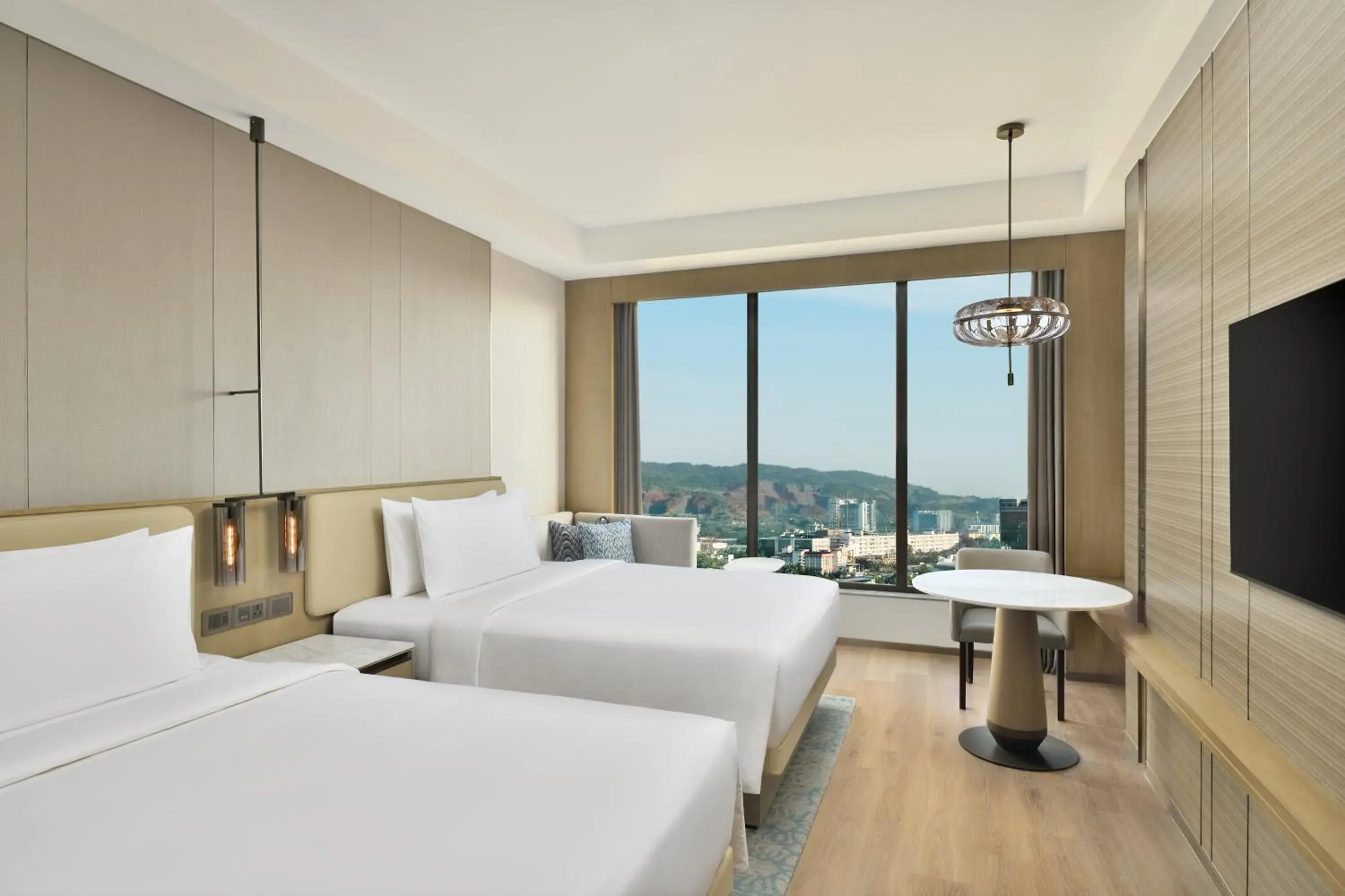 Club lounge access, Guest room, 2 Twins, Hill view - 10% discount on Food and Soft Beverage, Spa and Airport Transfers in Navi Mumbai Marriott Club lounge access, Guest room, 2 Twins, Hill view - 10% discount on Food and Soft Beverage, Spa and Airport Transfers in Navi Mumbai Marriott