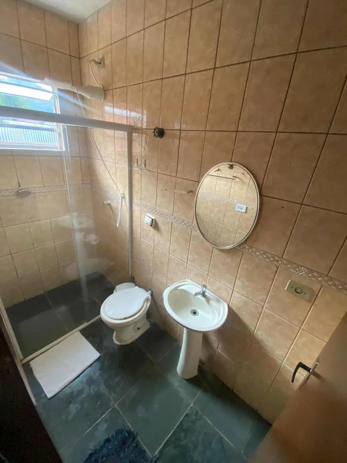 Bathroom in Pousada e Restaurante Frente Mar H Guarujá