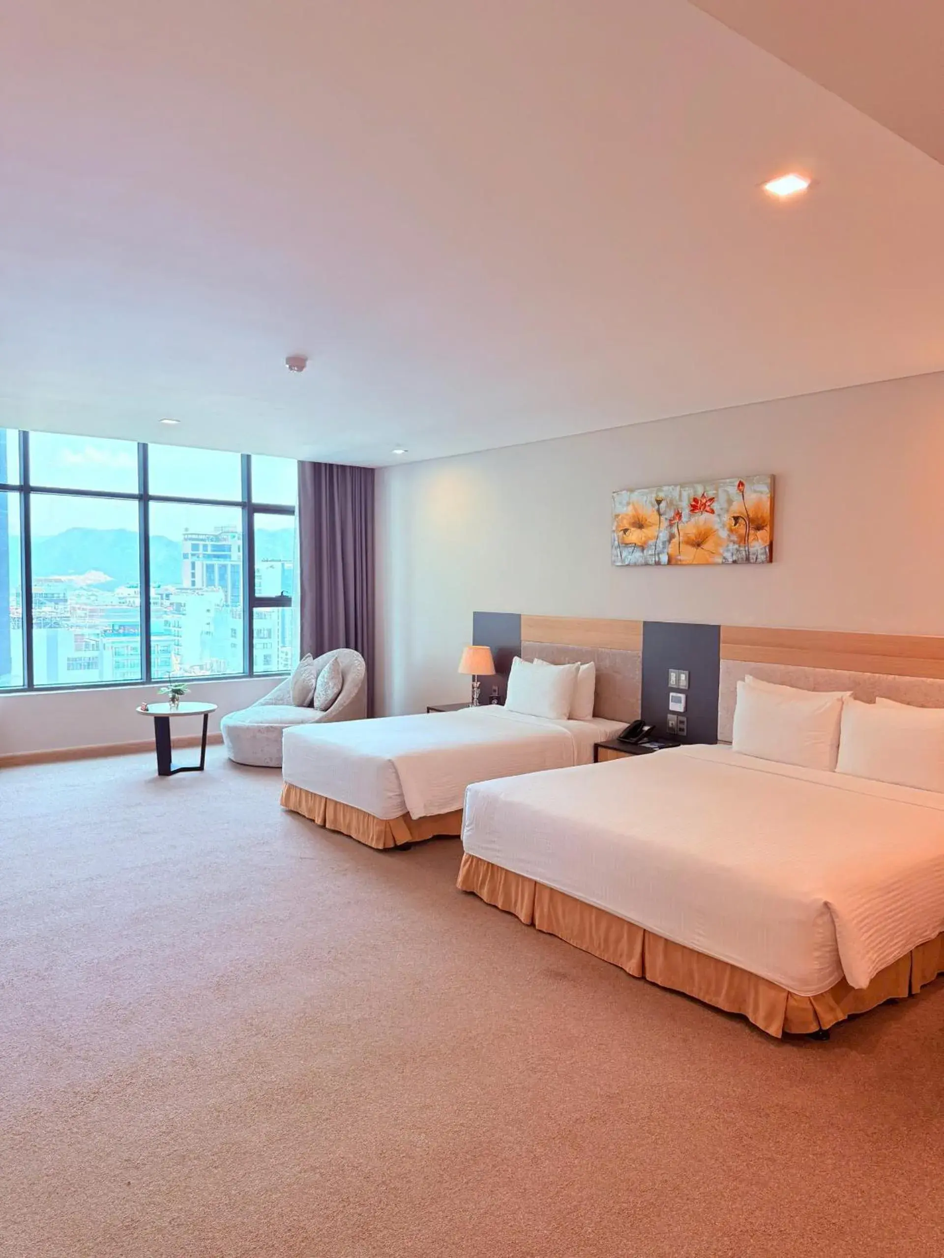 Deluxe Family Triple Room in Muong Thanh Luxury Nha Trang Hotel Deluxe Family Triple Room in Muong Thanh Luxury Nha Trang Hotel