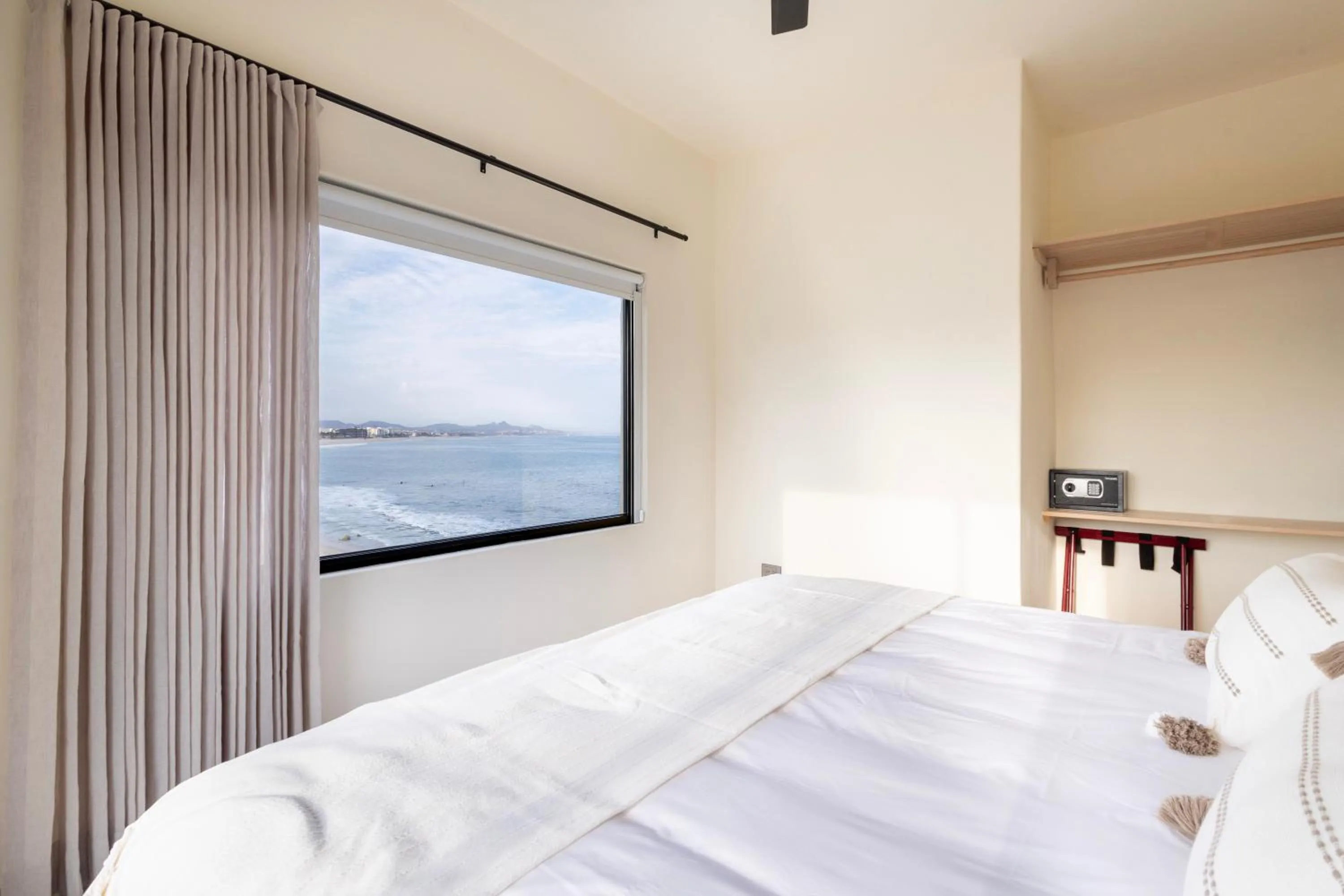 Bed in Cabo Break Hotel