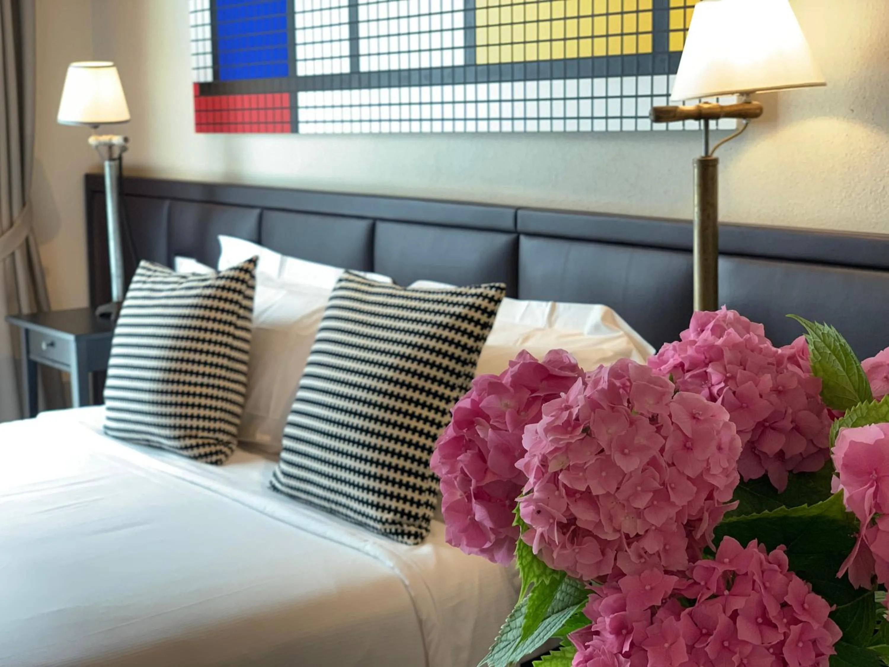 Decorative detail, Bed in Florence Art Apartments