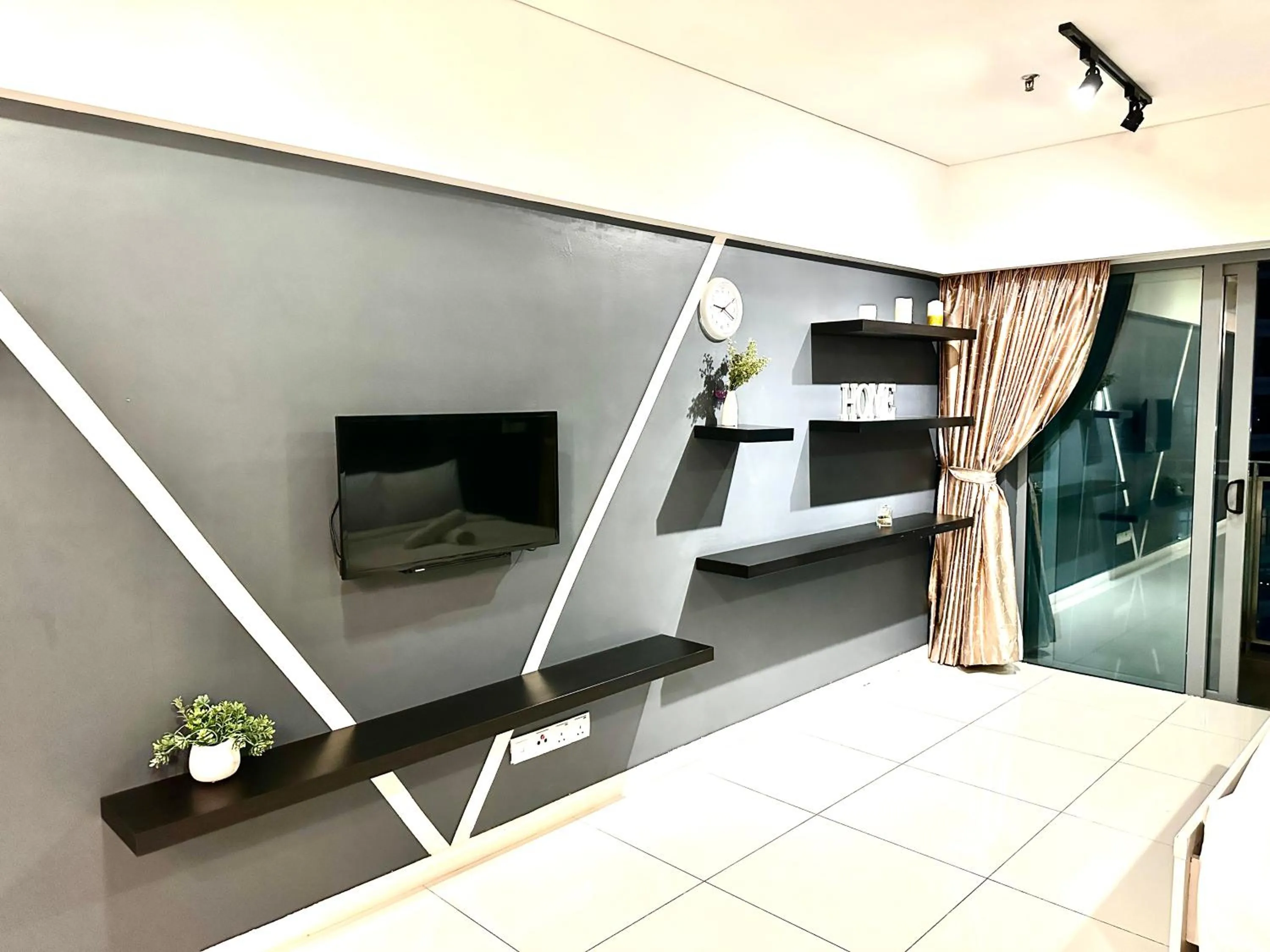 TV and multimedia in Summer Suites KLCC by Luna KL