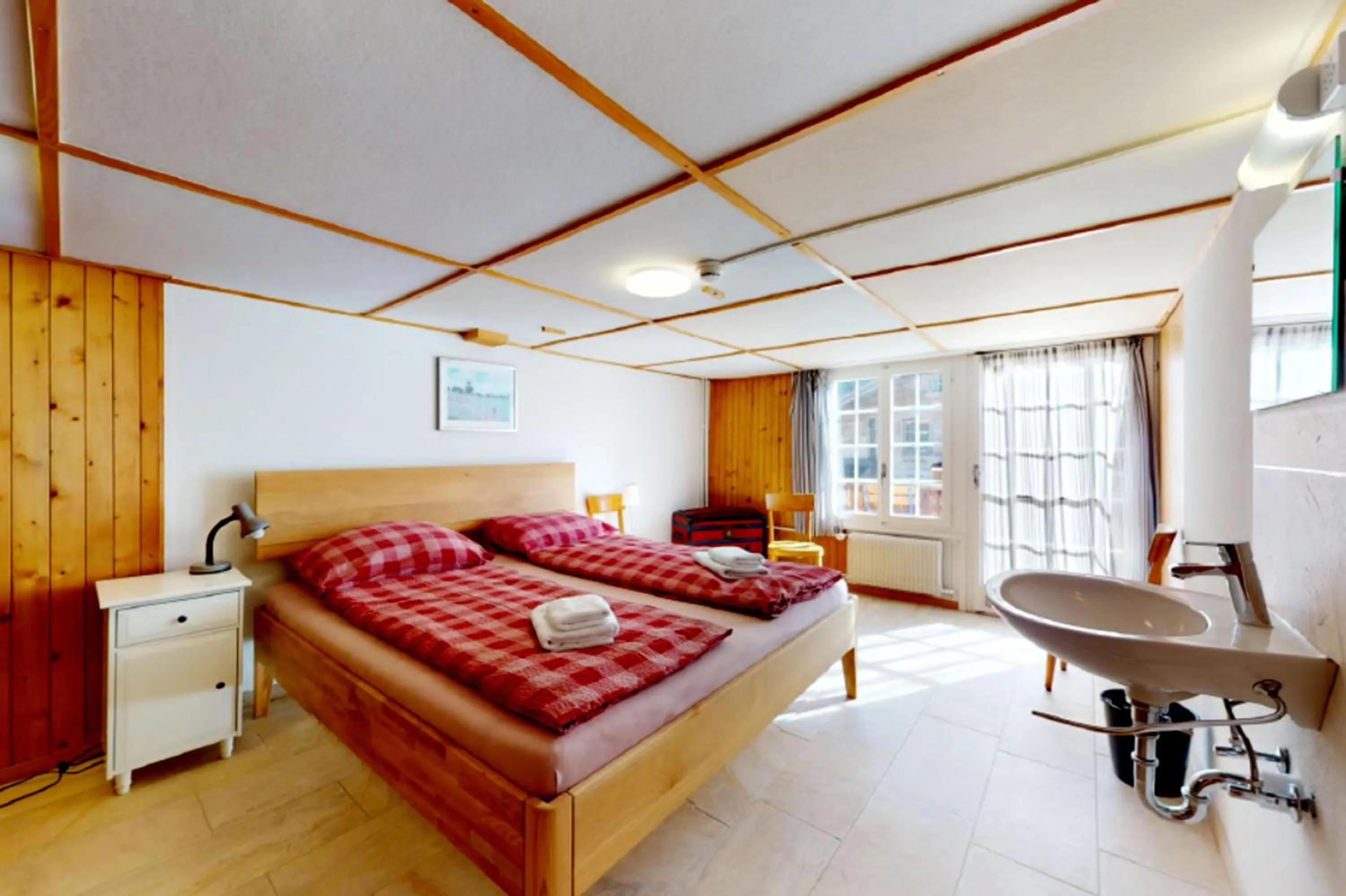 Bedroom in Gadmen Alpenrose, Switzerland