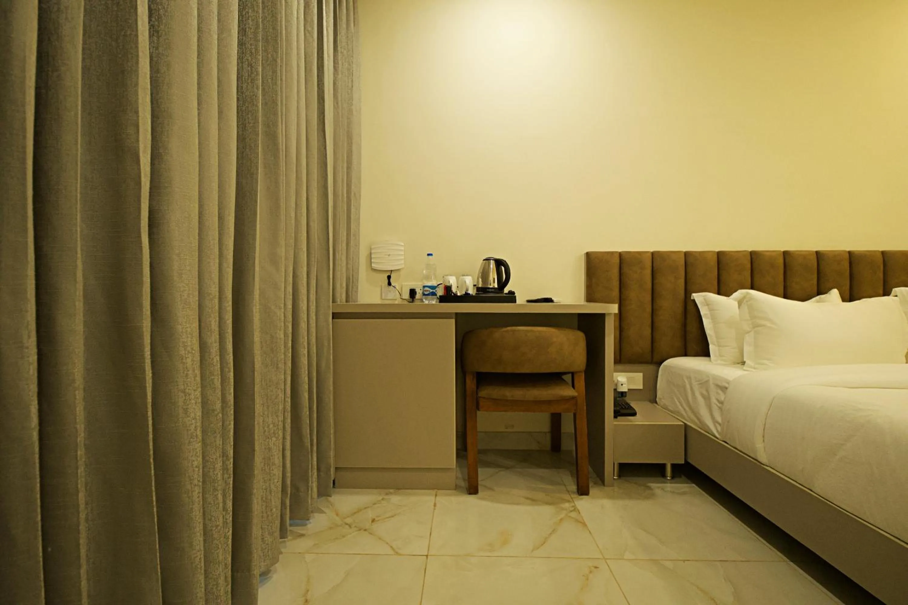 Bed in Veerdency Luxury resort