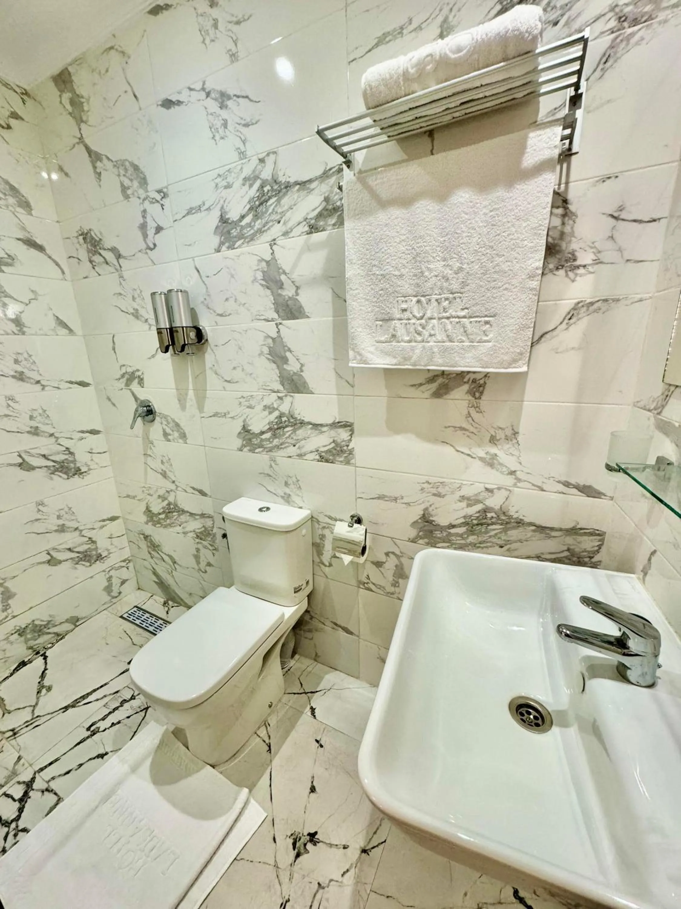 Toilet in The Hotel Syracuse