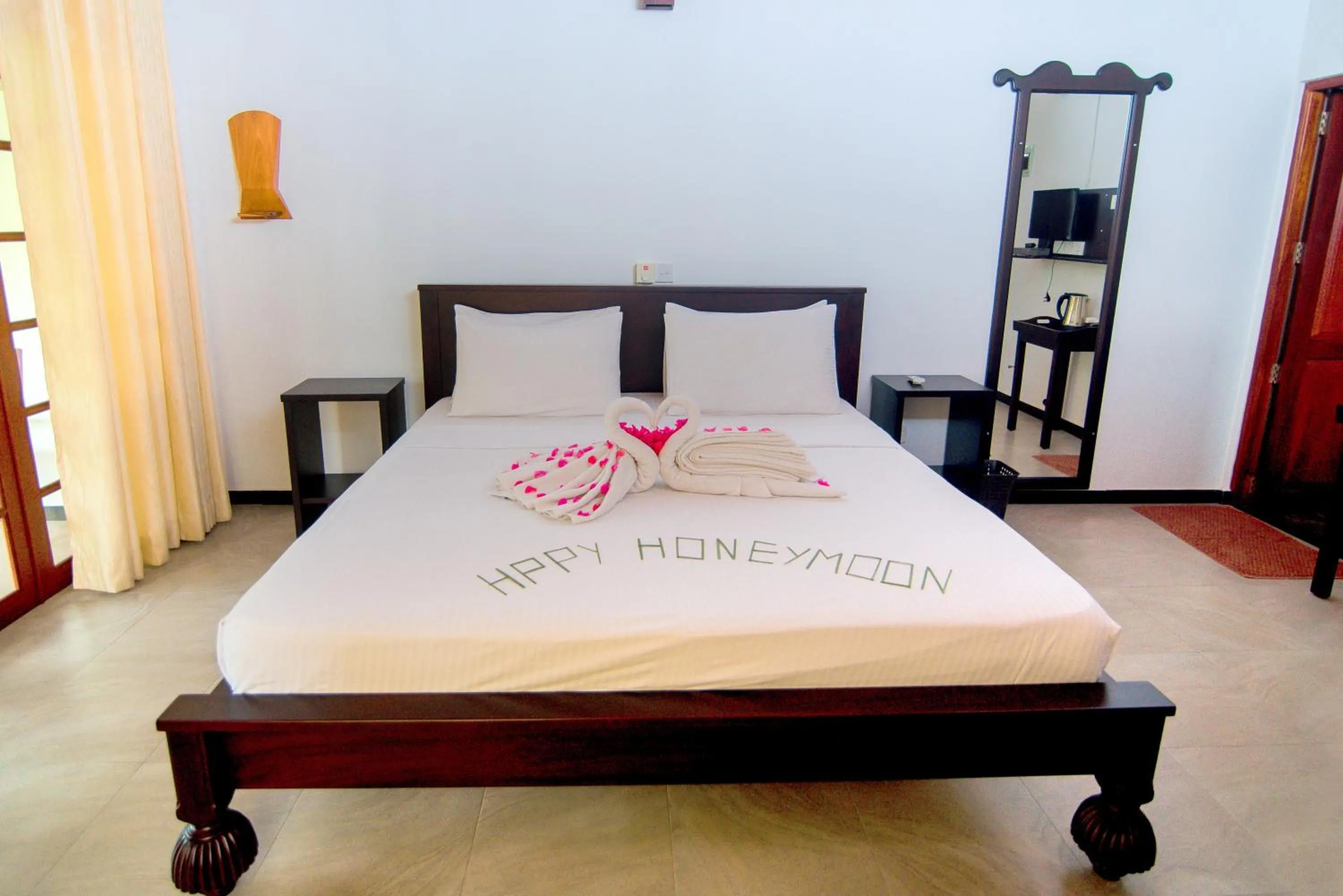 Bed in Lagoon Bentota Resort