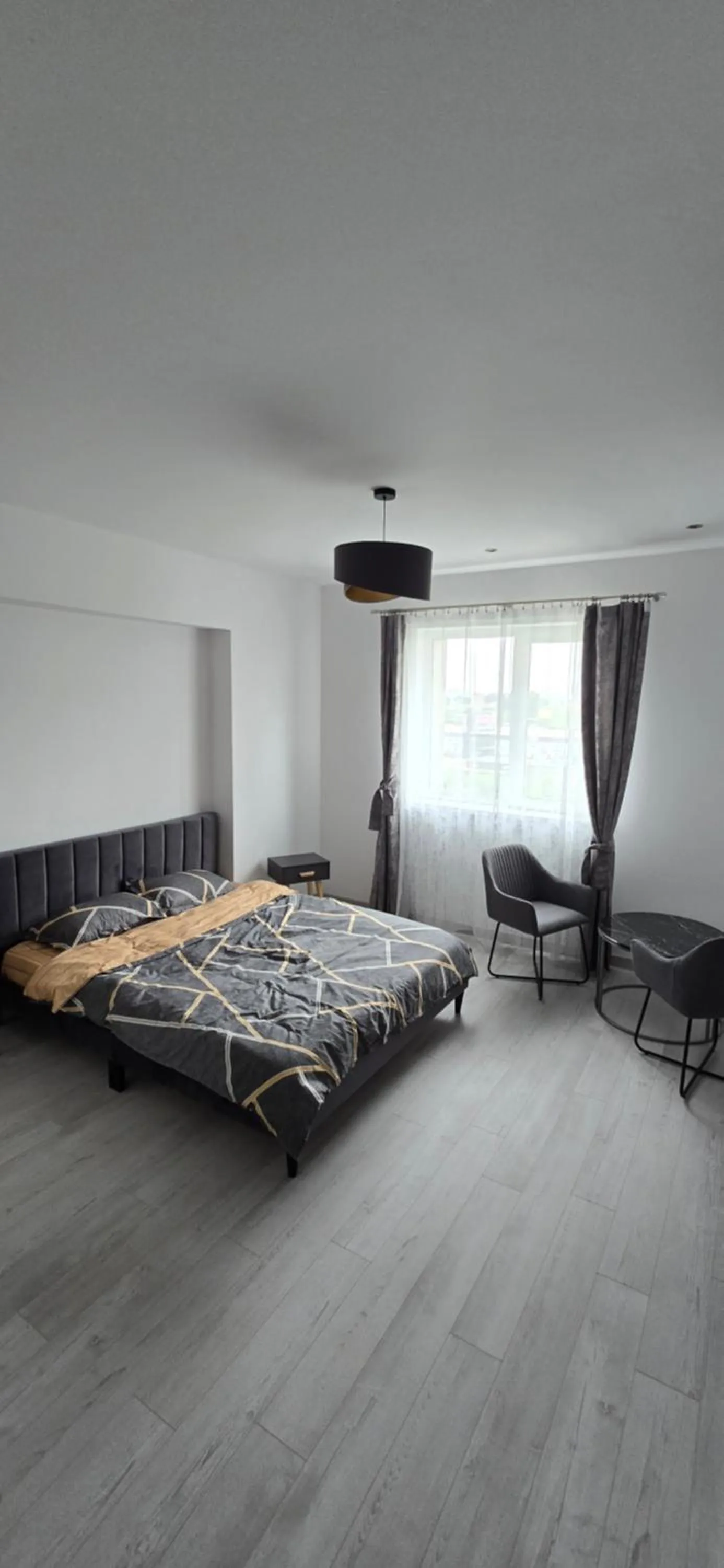 Bed in Camera de Inchiriat in Rin Grand Hotel