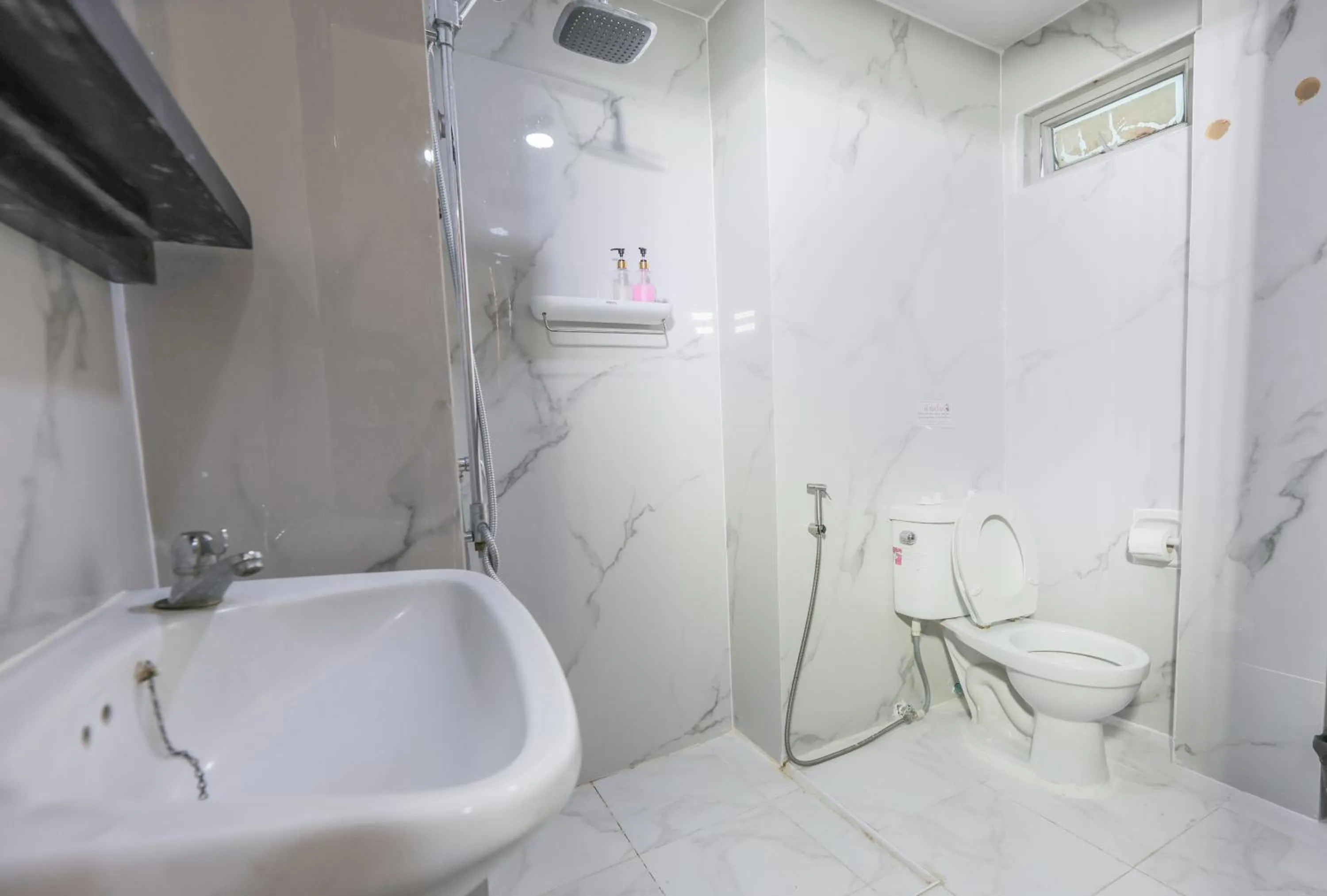 Toilet in Bud Brew Beyond Dispensary and Hotel