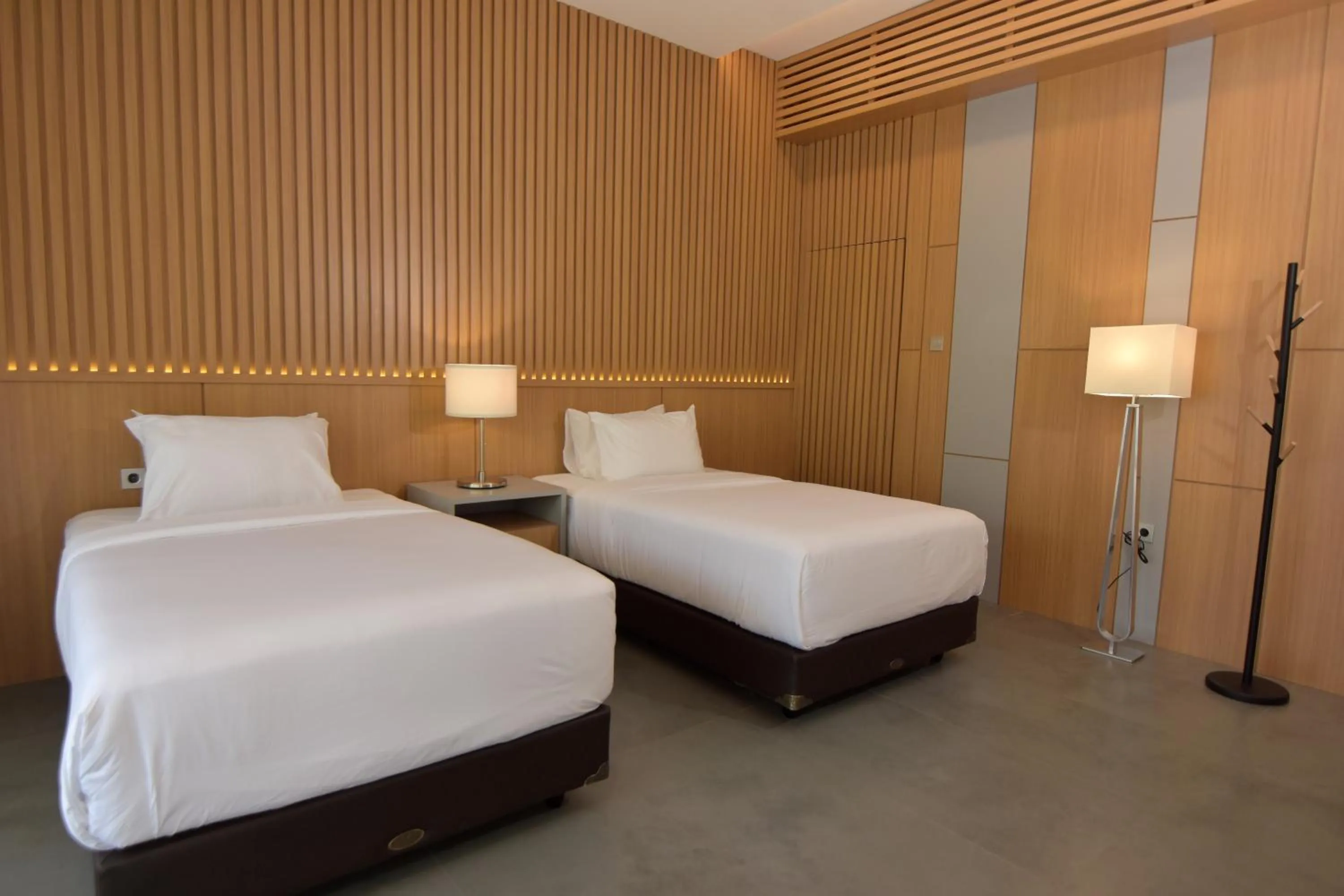 Bed in Sarga Earthing Resort