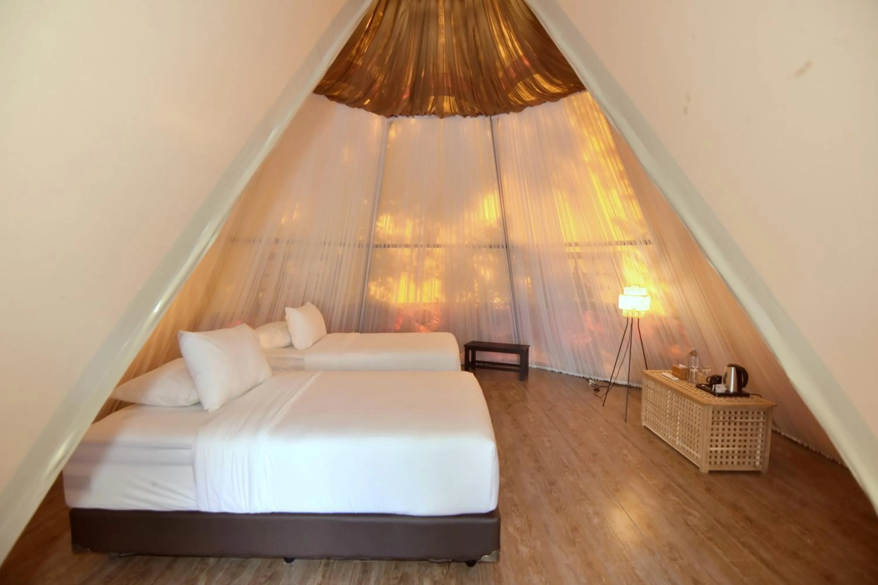 Bed in Sarga Earthing Resort