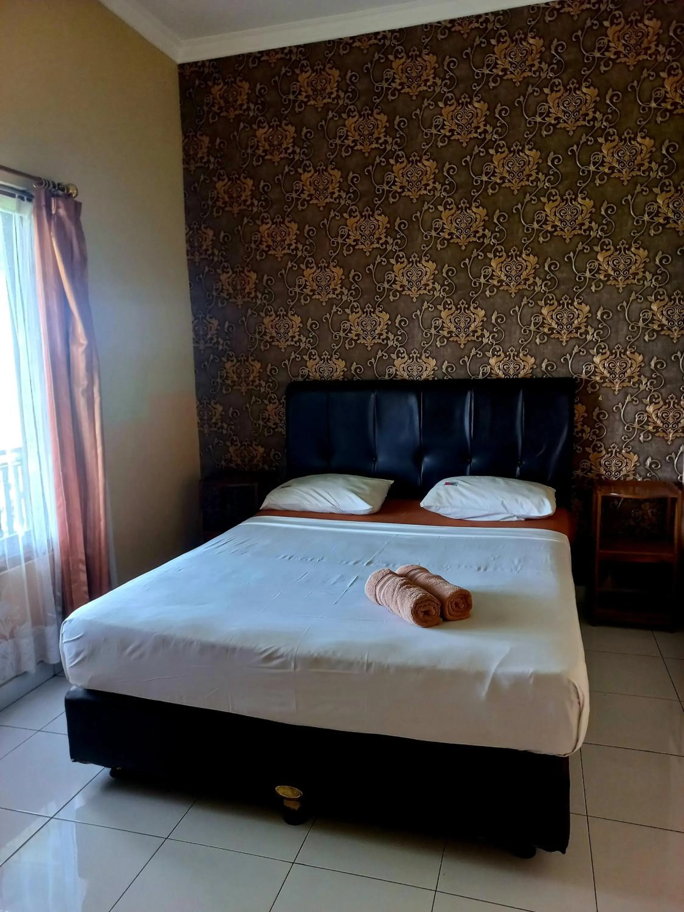 Bed in Hotel Omah Cepit