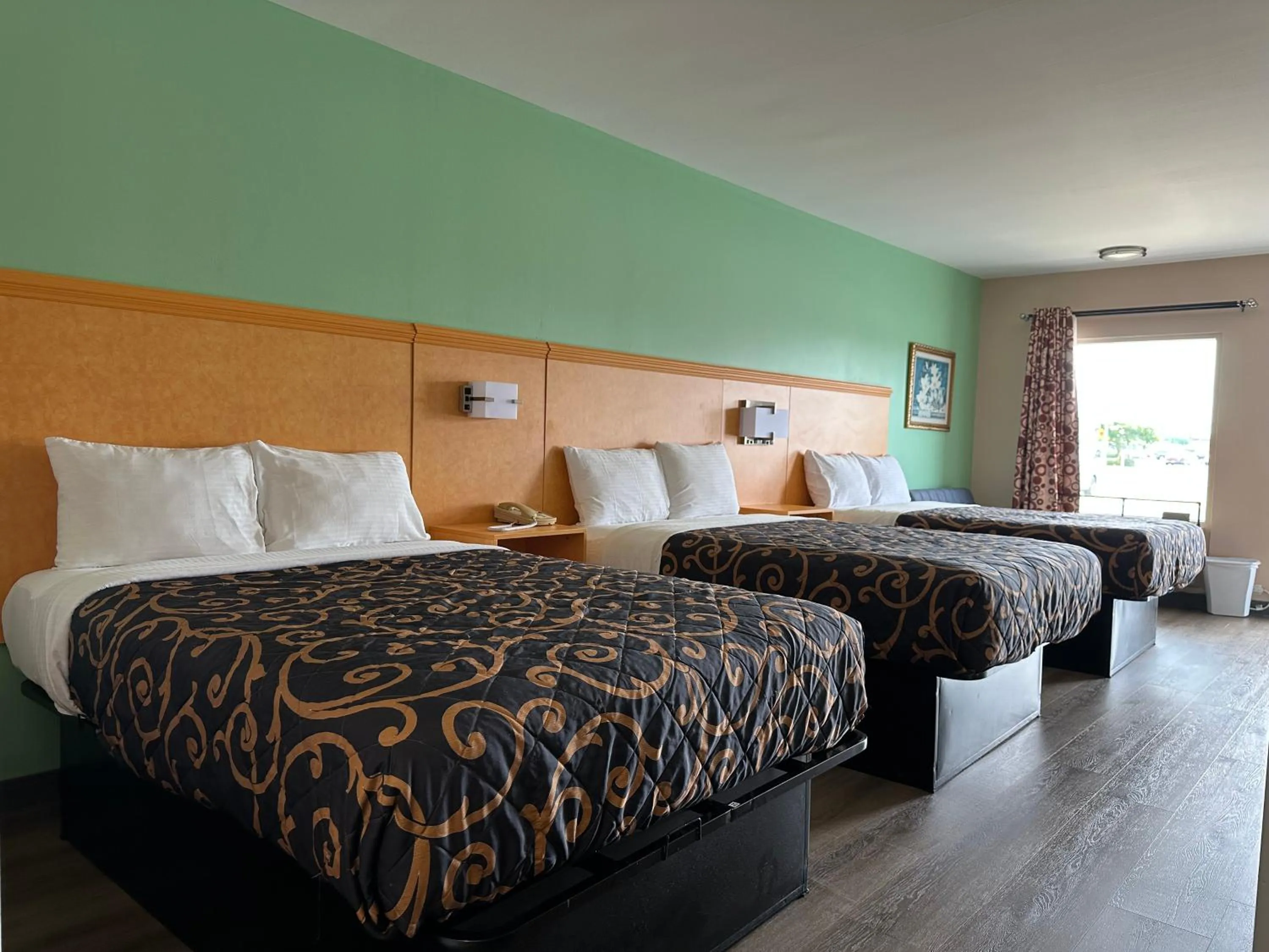 Bed in Security Inn and Suites