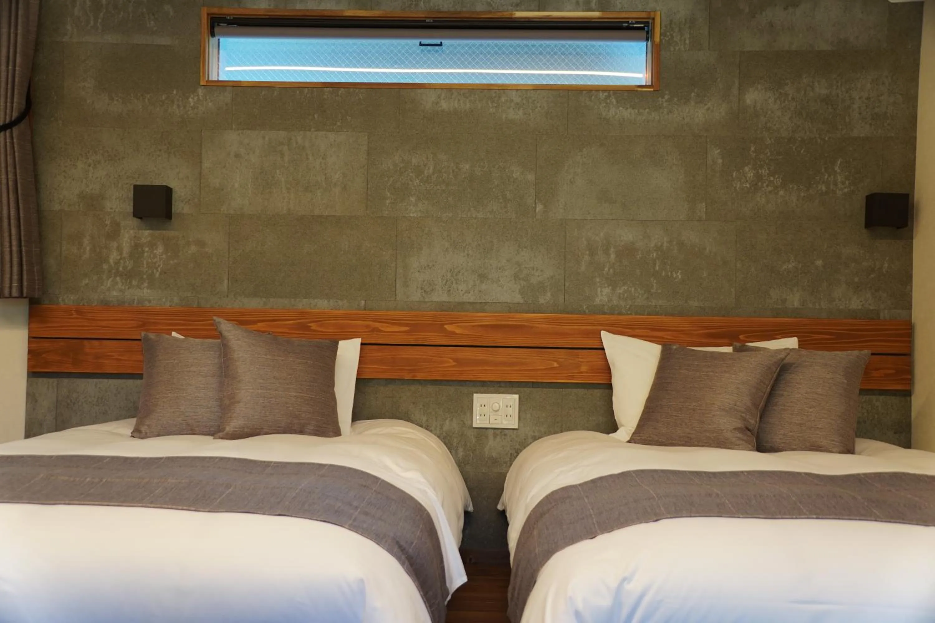 Bed in SAUNA VILLA 然