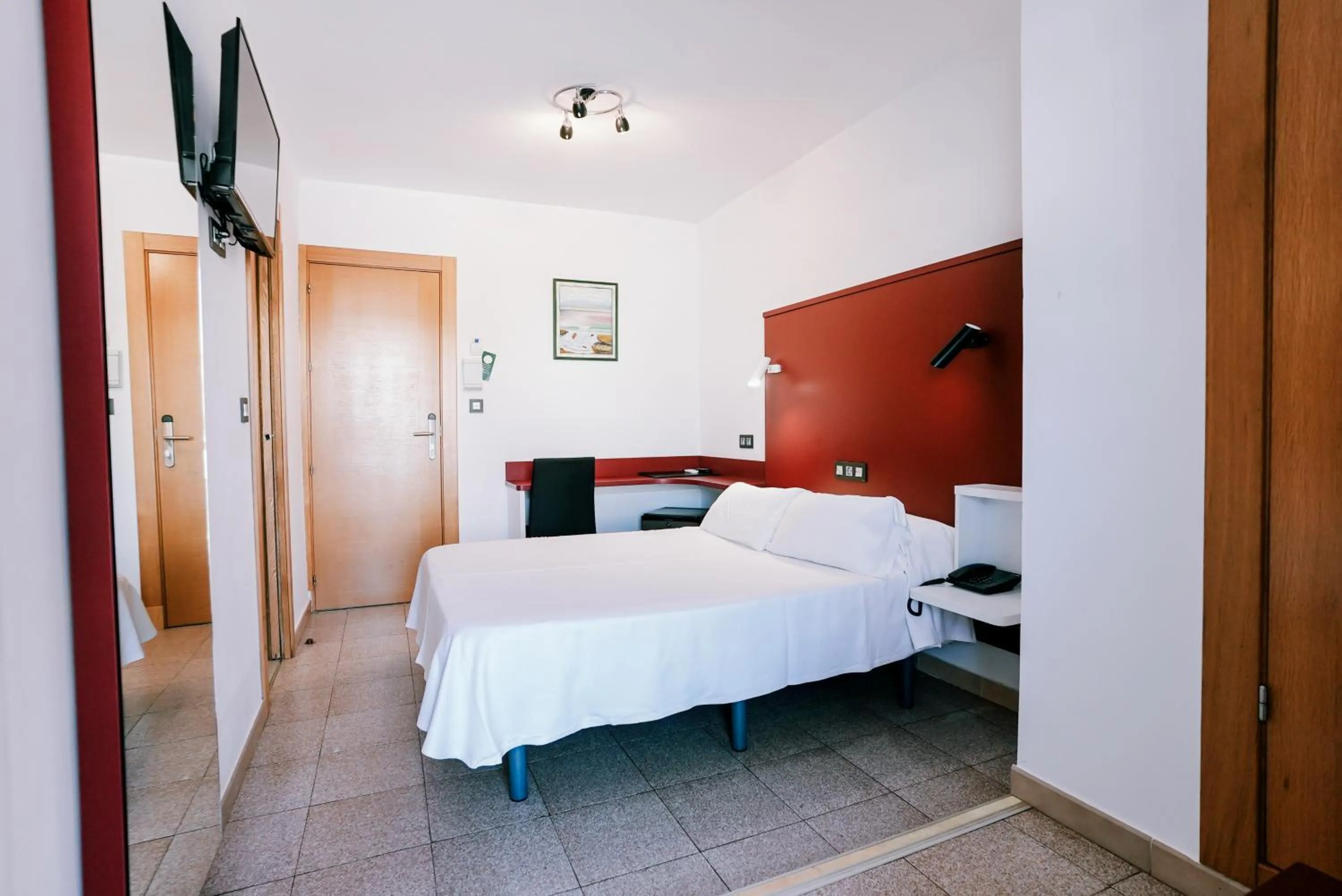 Bed in Hospedium Hotel Continental