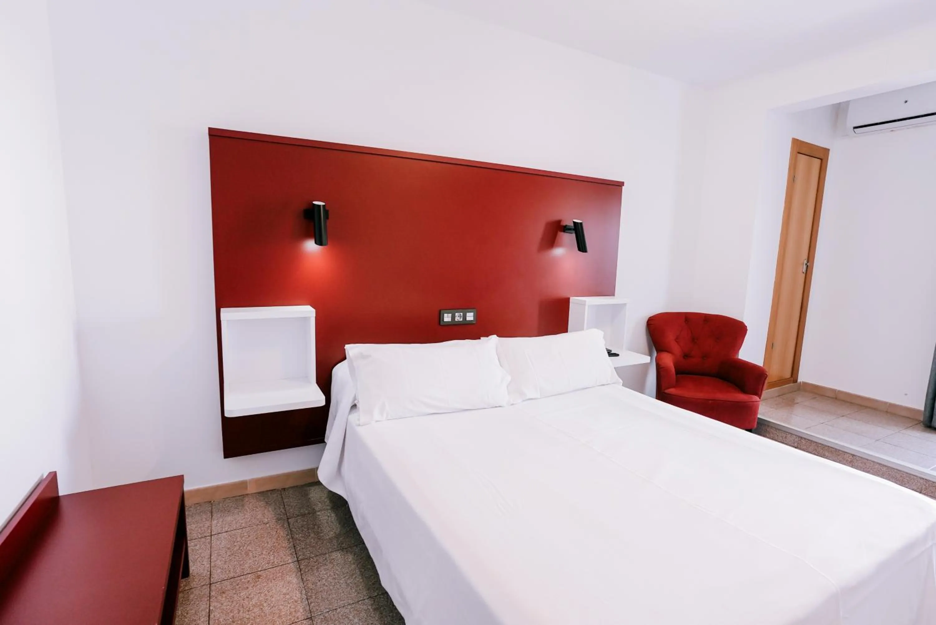 Bed in Hospedium Hotel Continental