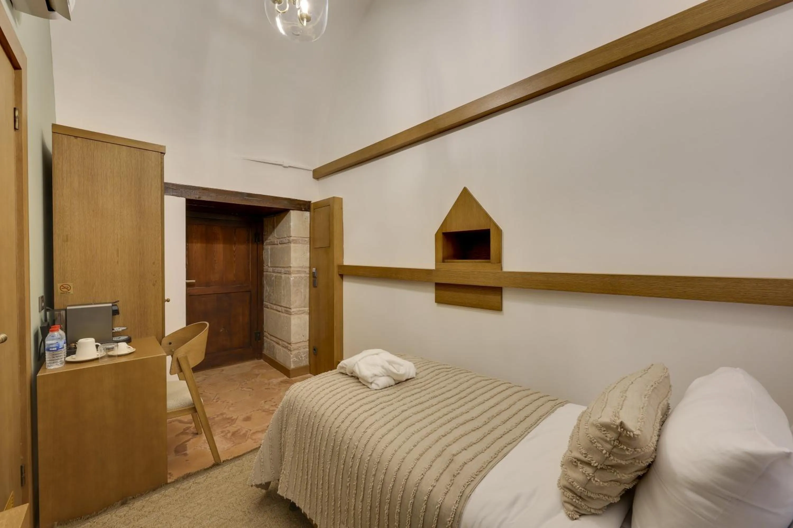 Bed in Silk Road Museum Hotel