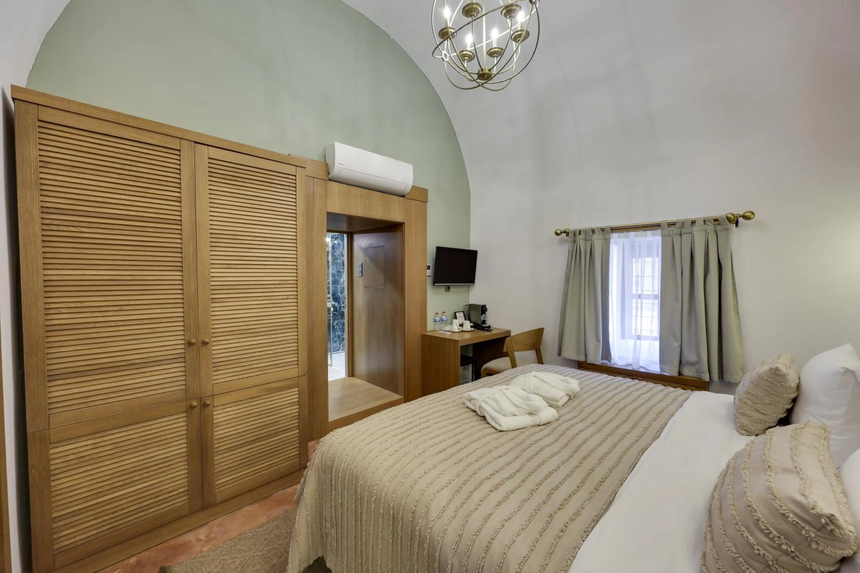 Bed in Silk Road Museum Hotel