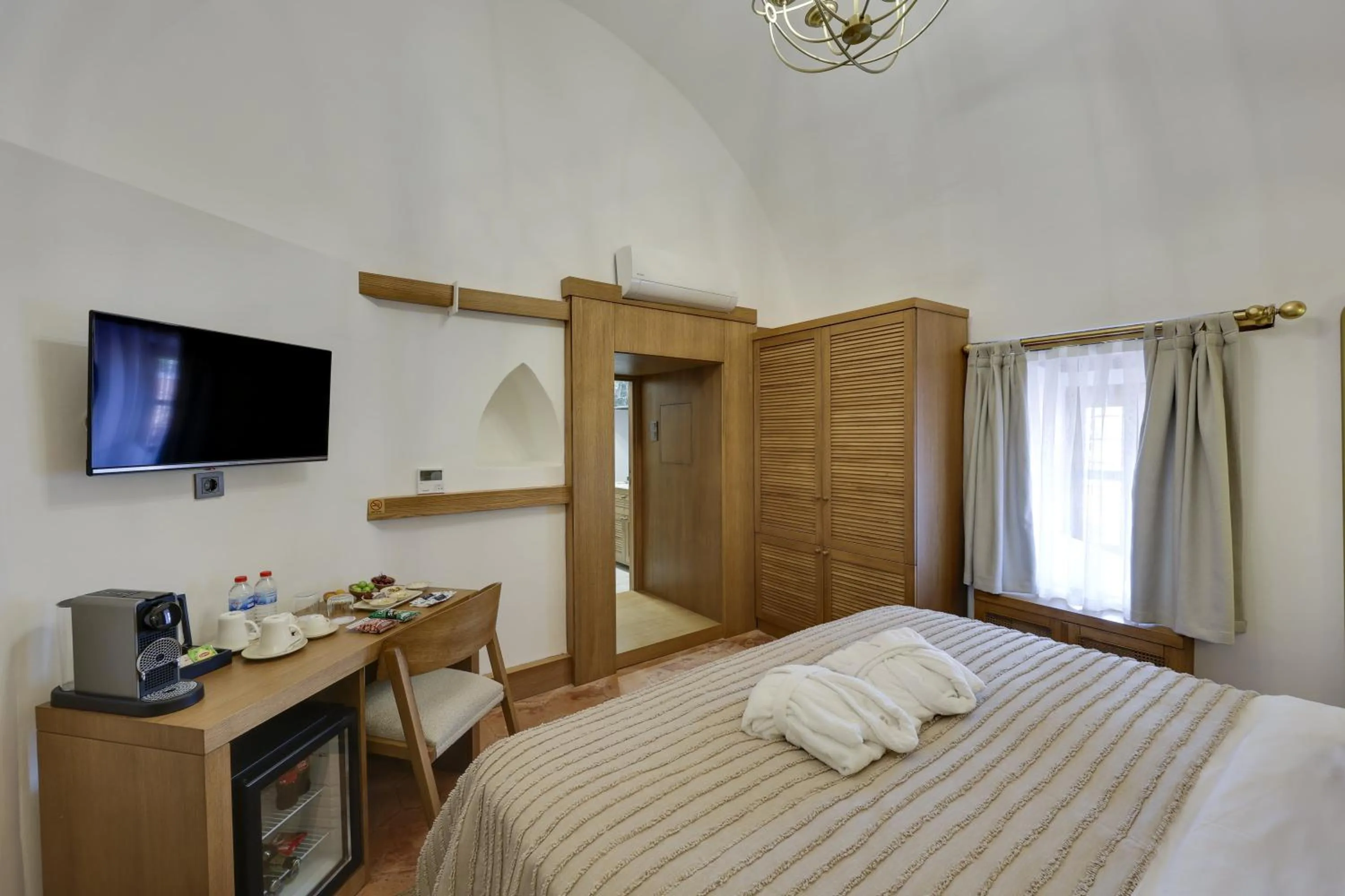 Bed in Silk Road Museum Hotel