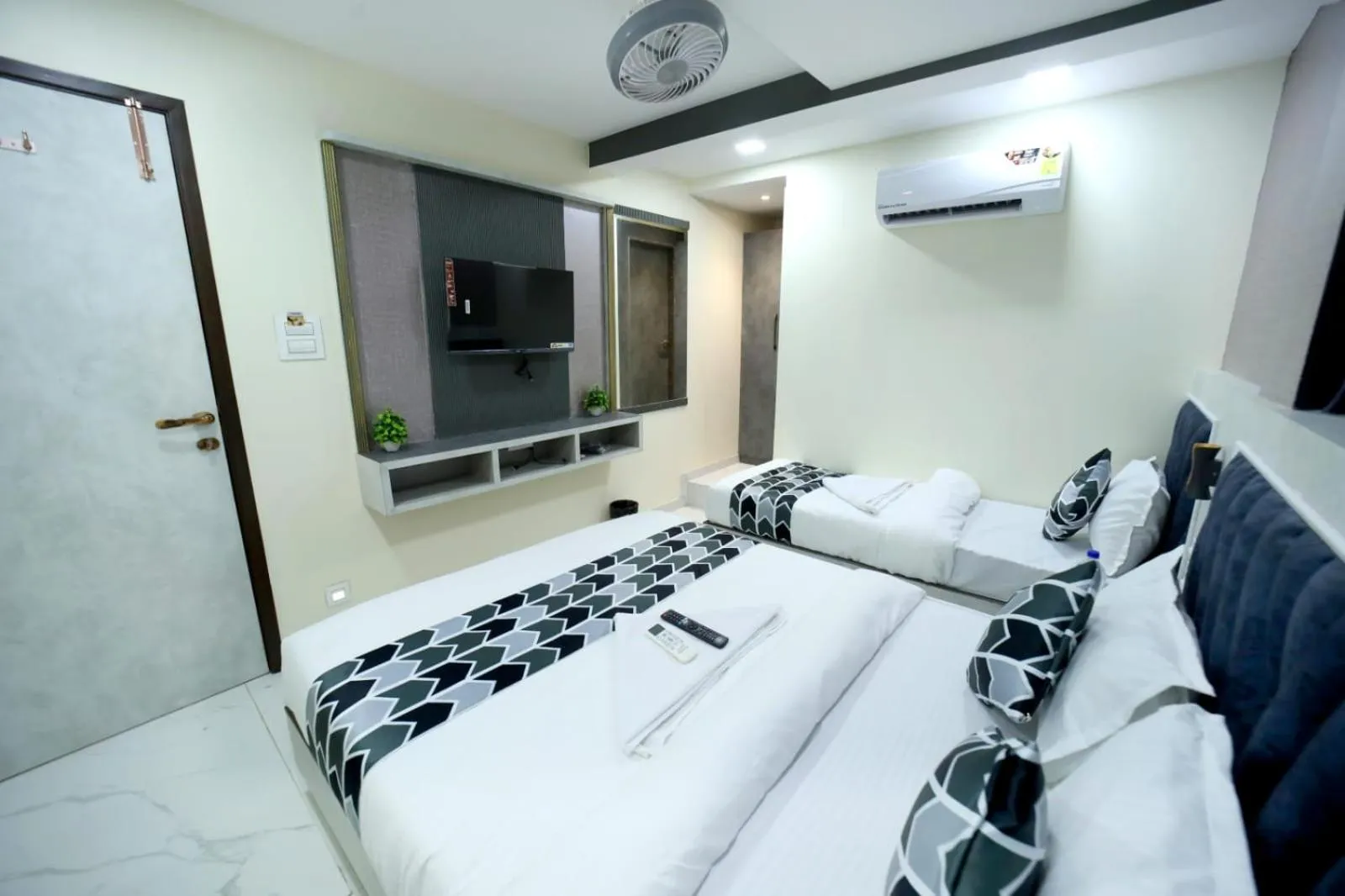 Photo of the whole room, Bed in N.M. Hotel