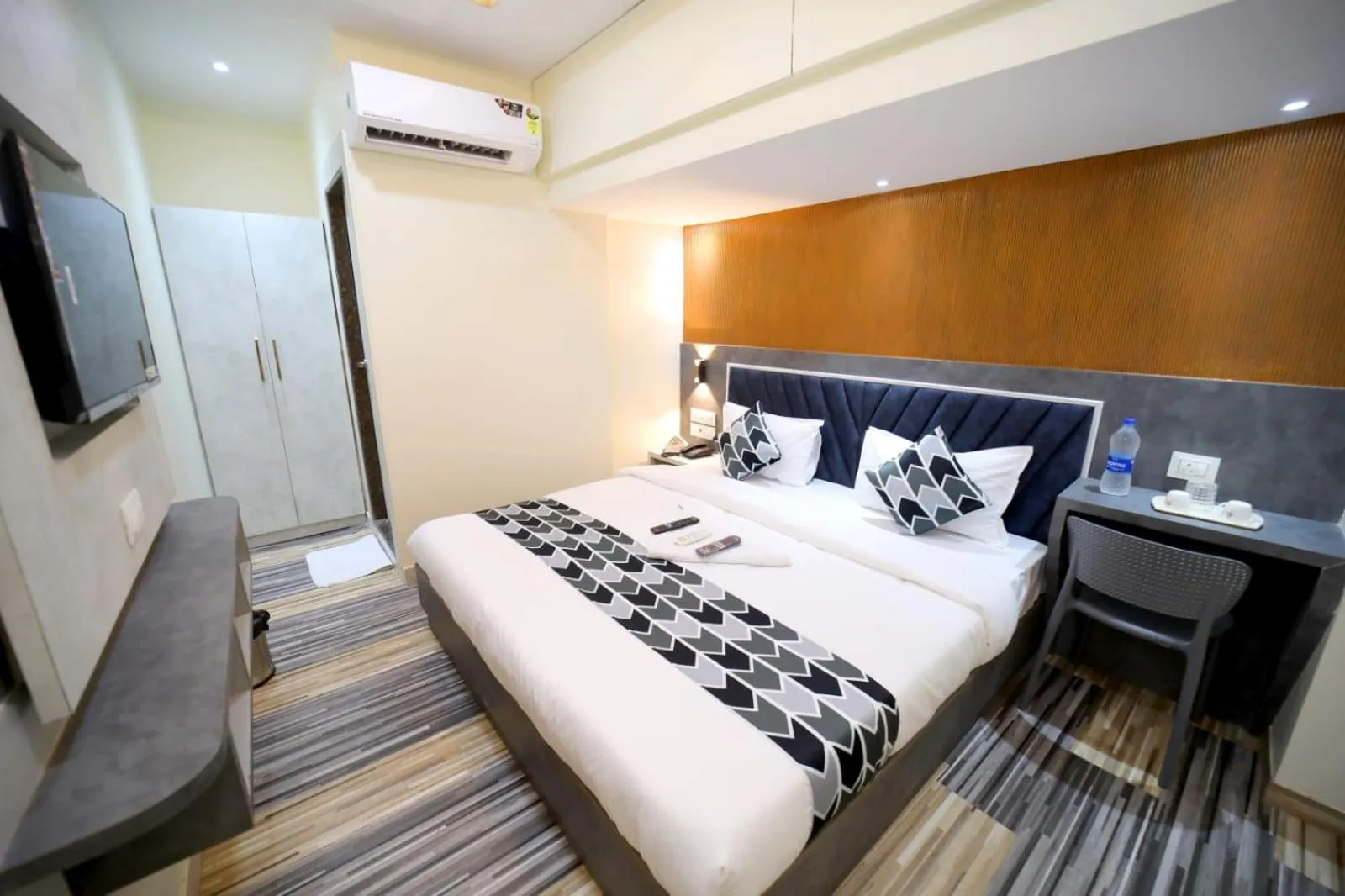 Photo of the whole room, Bed in N.M. Hotel