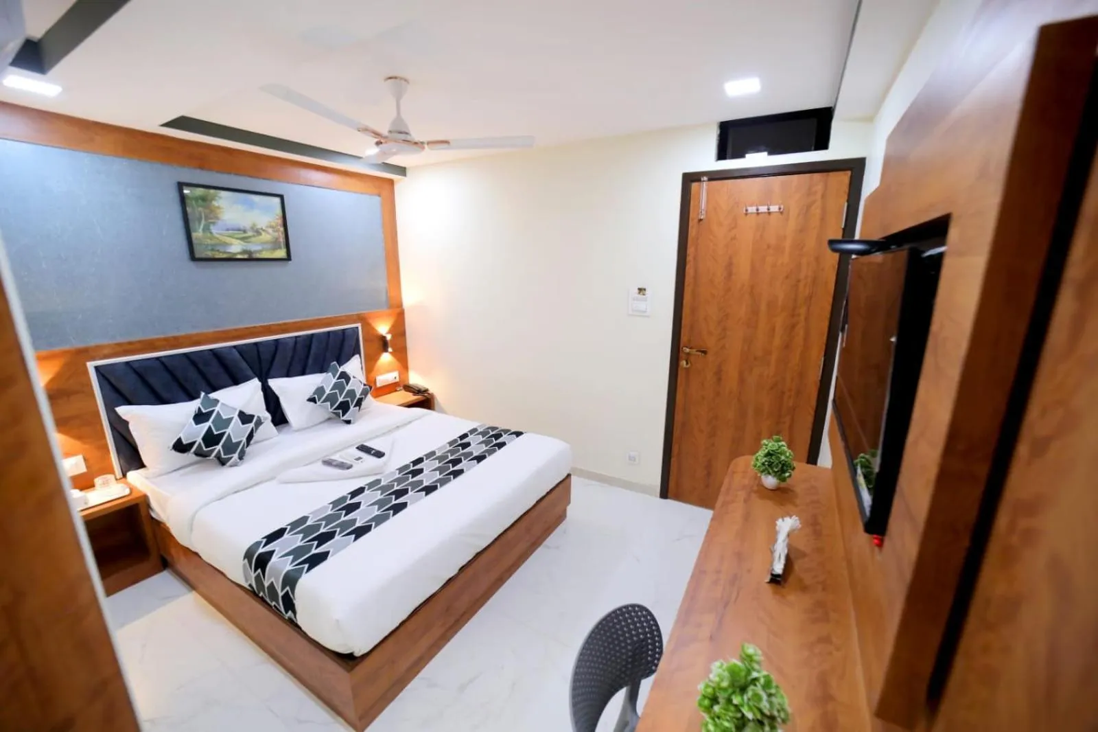 Photo of the whole room, Bed in N.M. Hotel