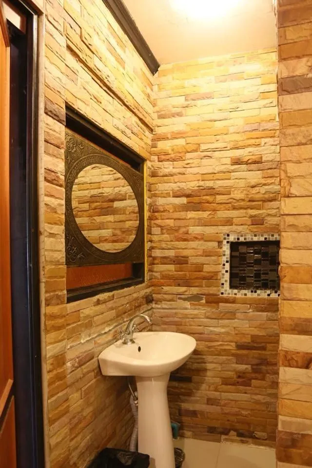 Bathroom in Phalaburi resort by dreamhouse
