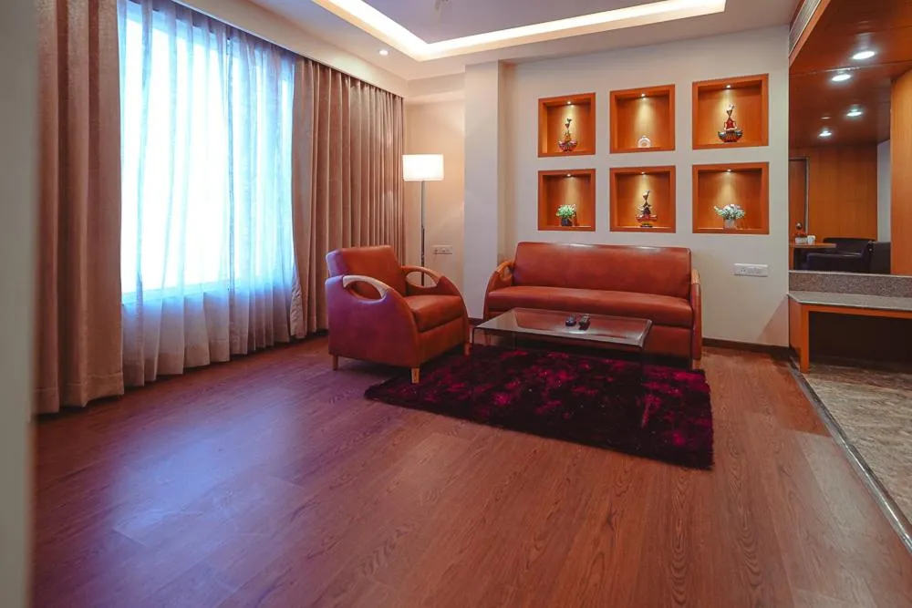 Seating area in Ramee The Srinivas Palace