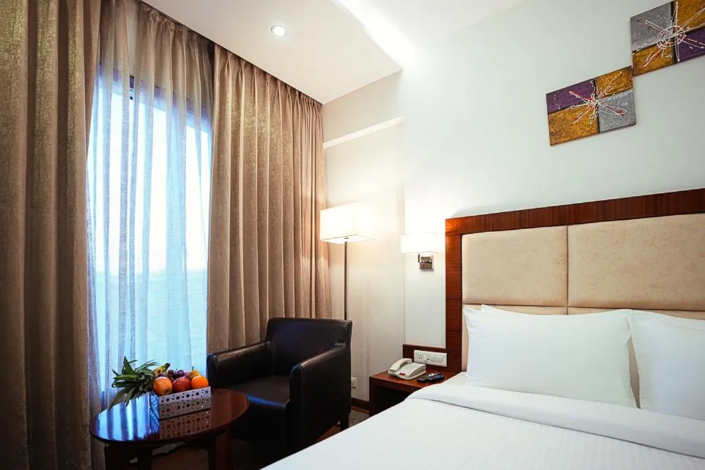 Bed in Ramee The Srinivas Palace