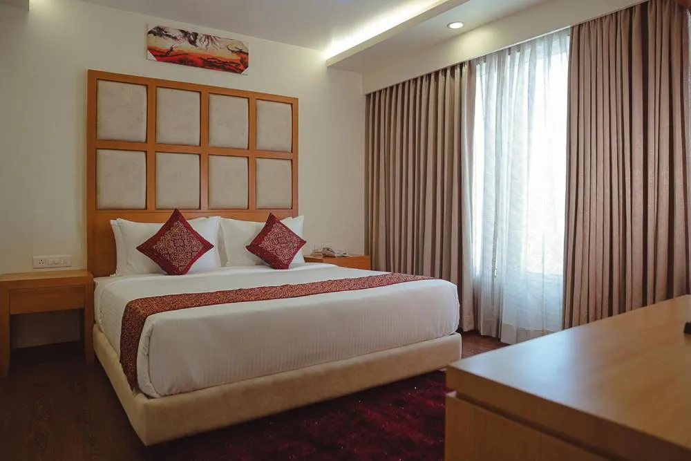 Bed in Ramee The Srinivas Palace