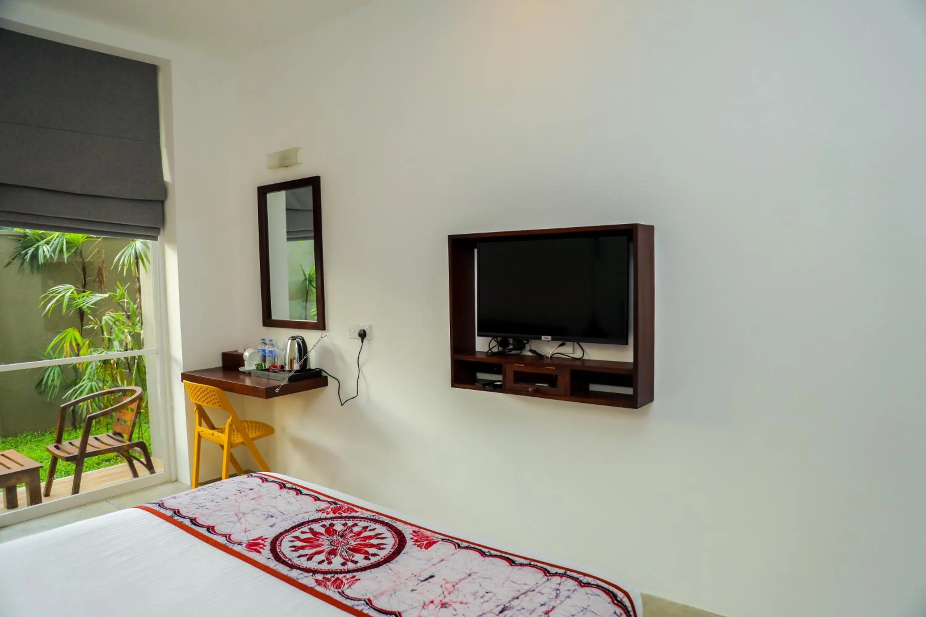 Bed in The Chariot Hikkduwa Resort