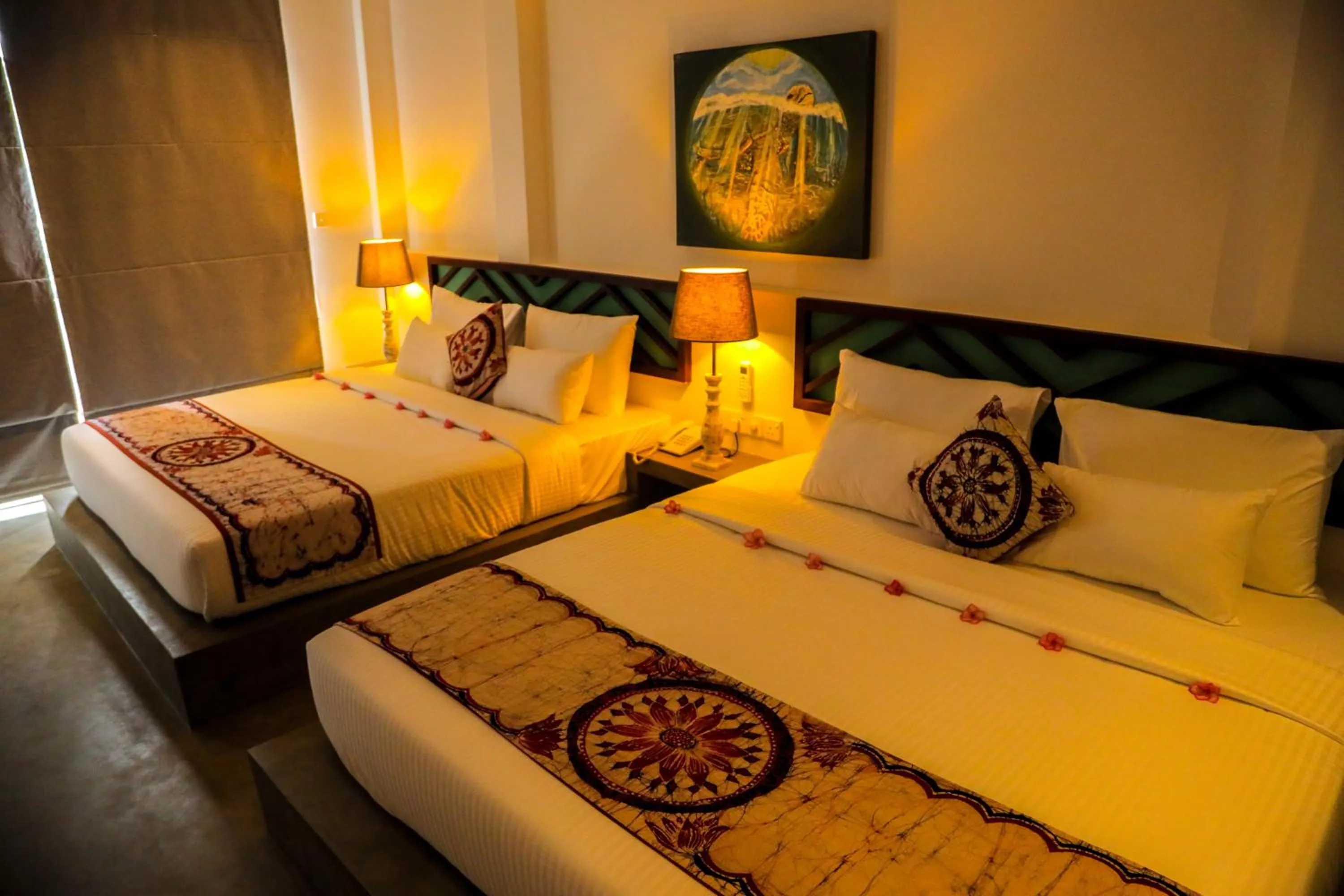 Bed in The Chariot Hikkduwa Resort