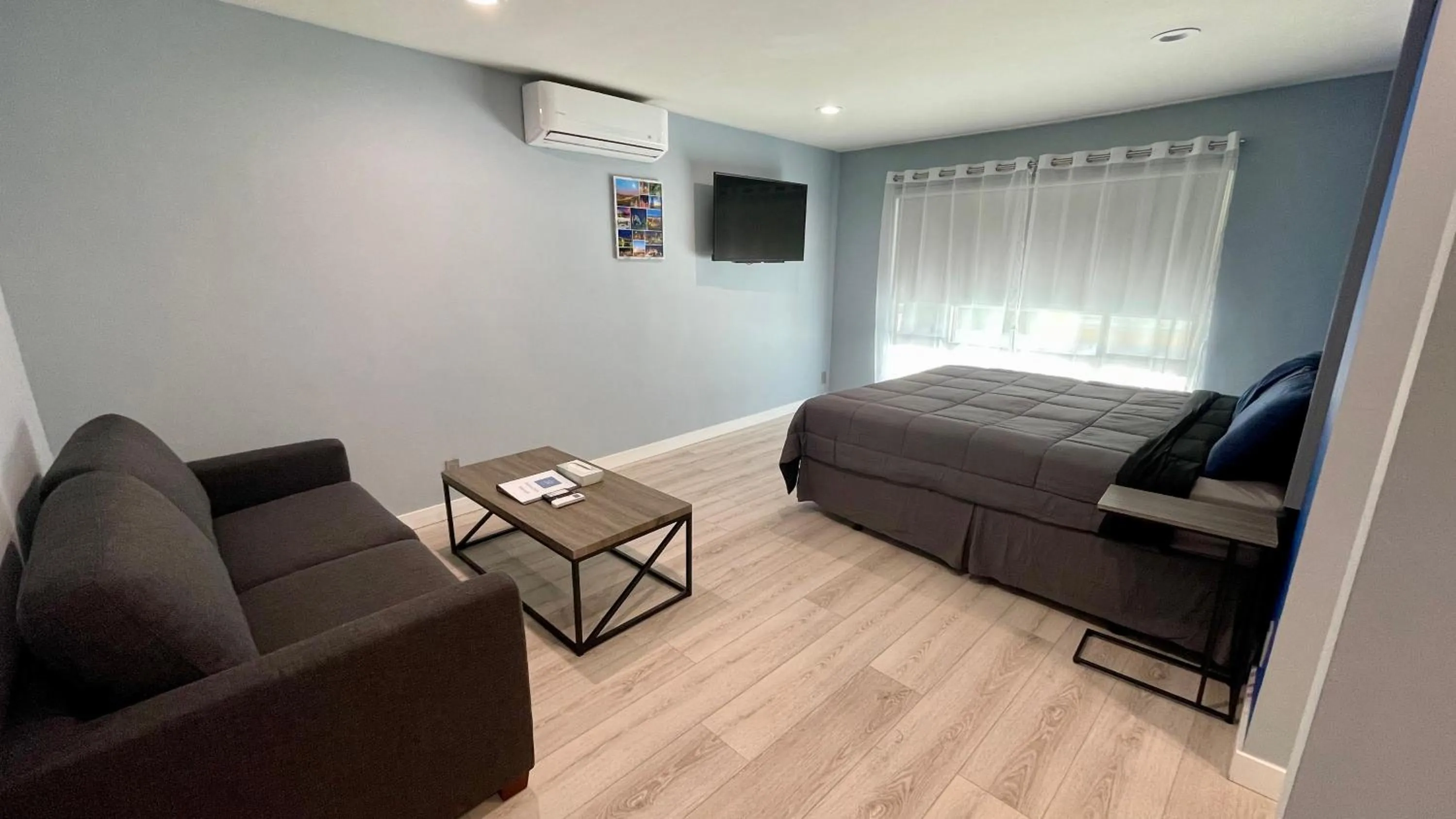 Bed in Quintessence ApartHotel