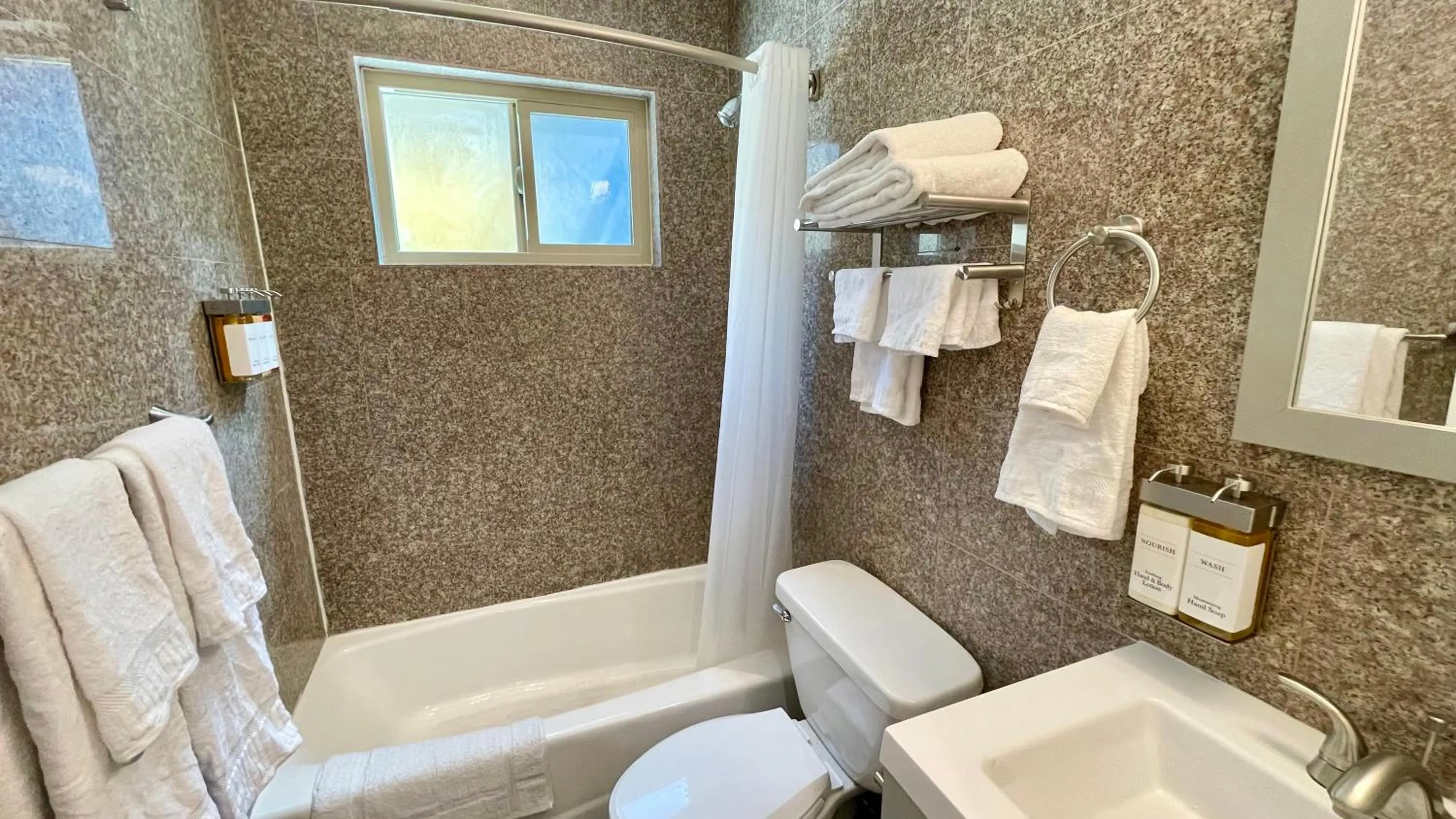 Bathroom in Quintessence ApartHotel