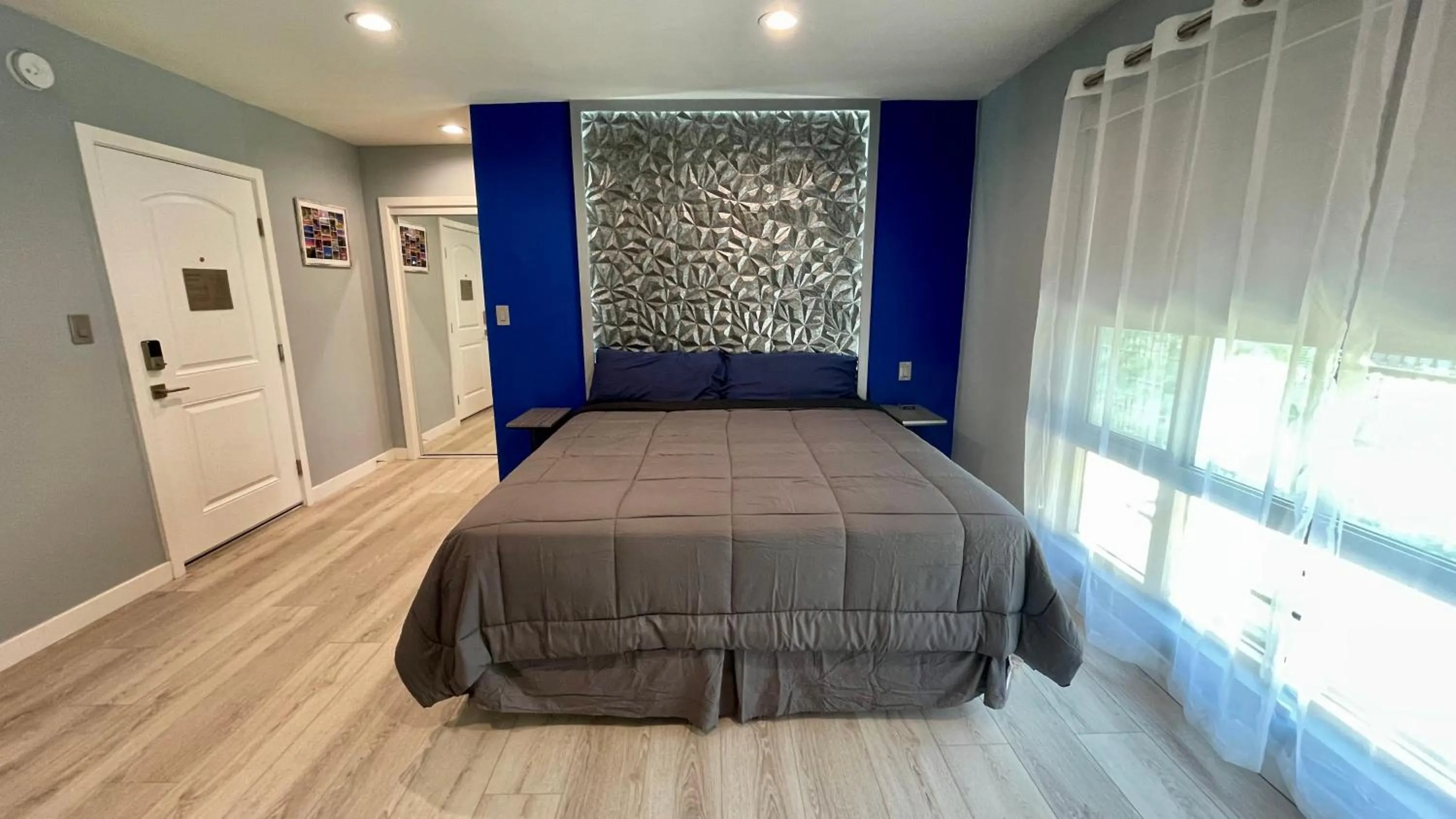 Bed in Quintessence ApartHotel